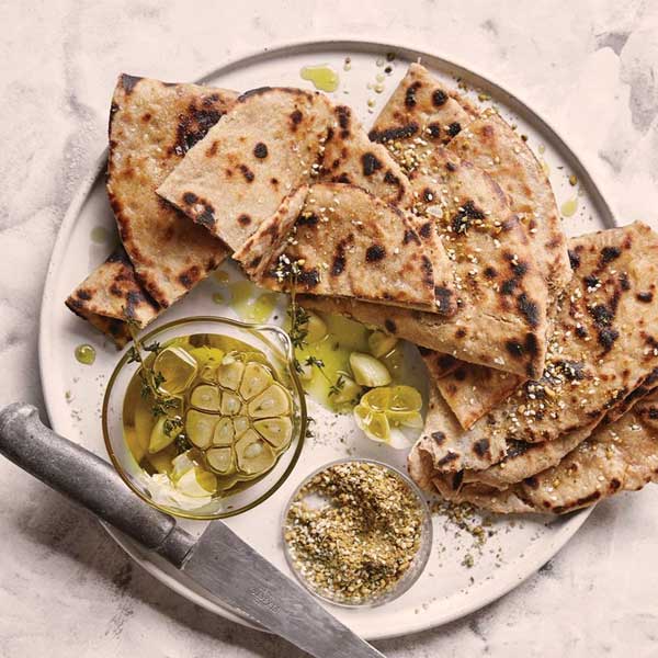 This type of flatbread has been made since ancient Egypt, originally using emmer wheat. The dough was naturally leavened with wild yeast and baked in traditional clay ovens crafted from Nile River mud. Be sure to try it during your cheap package Egypt experience!