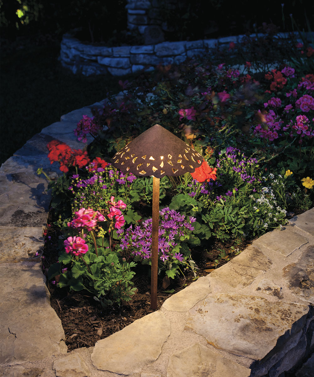 Ashtabula Ohio home with flower bed in garden accent wall and path landscape lighting
