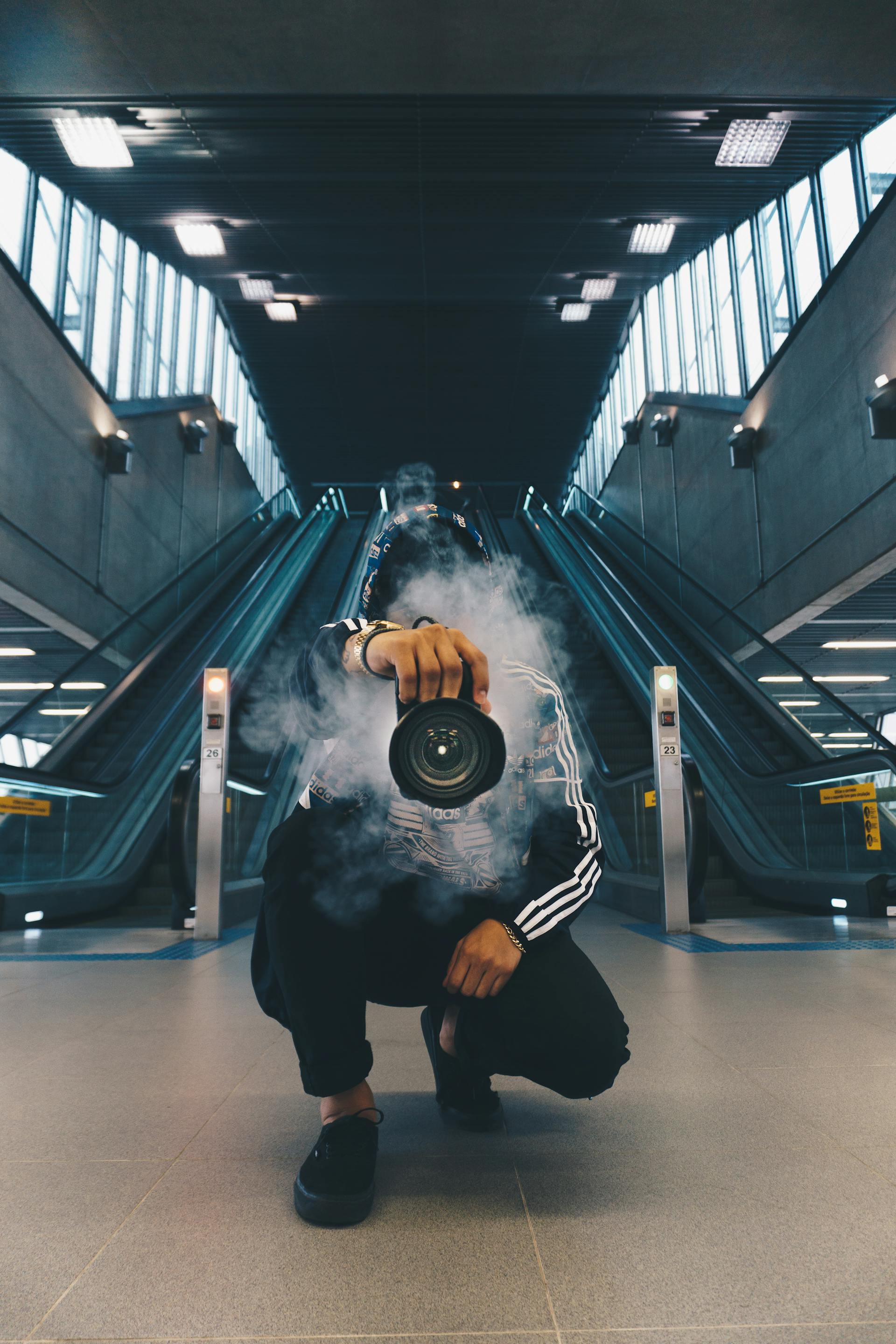 Alexander Novak with camera in urban setting