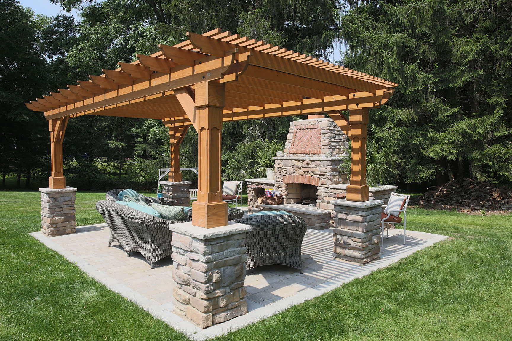 Cleveland Ohio backyard with wood cedar pergola and outdoor fireplace