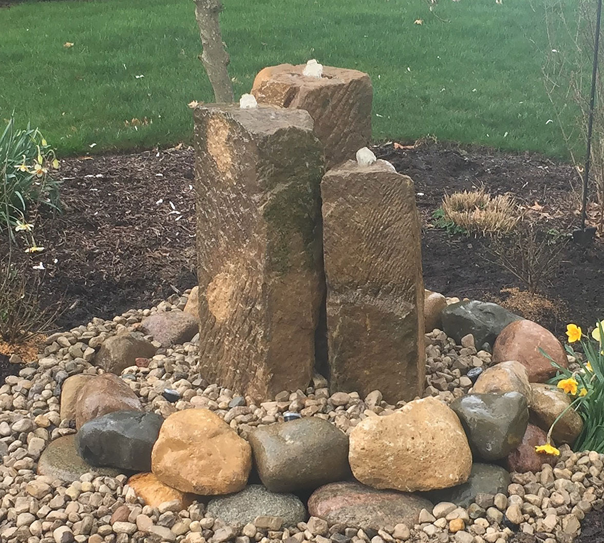 Natural Barn Stone Bubbler Water Fountain in Kirtland Ohio backyard