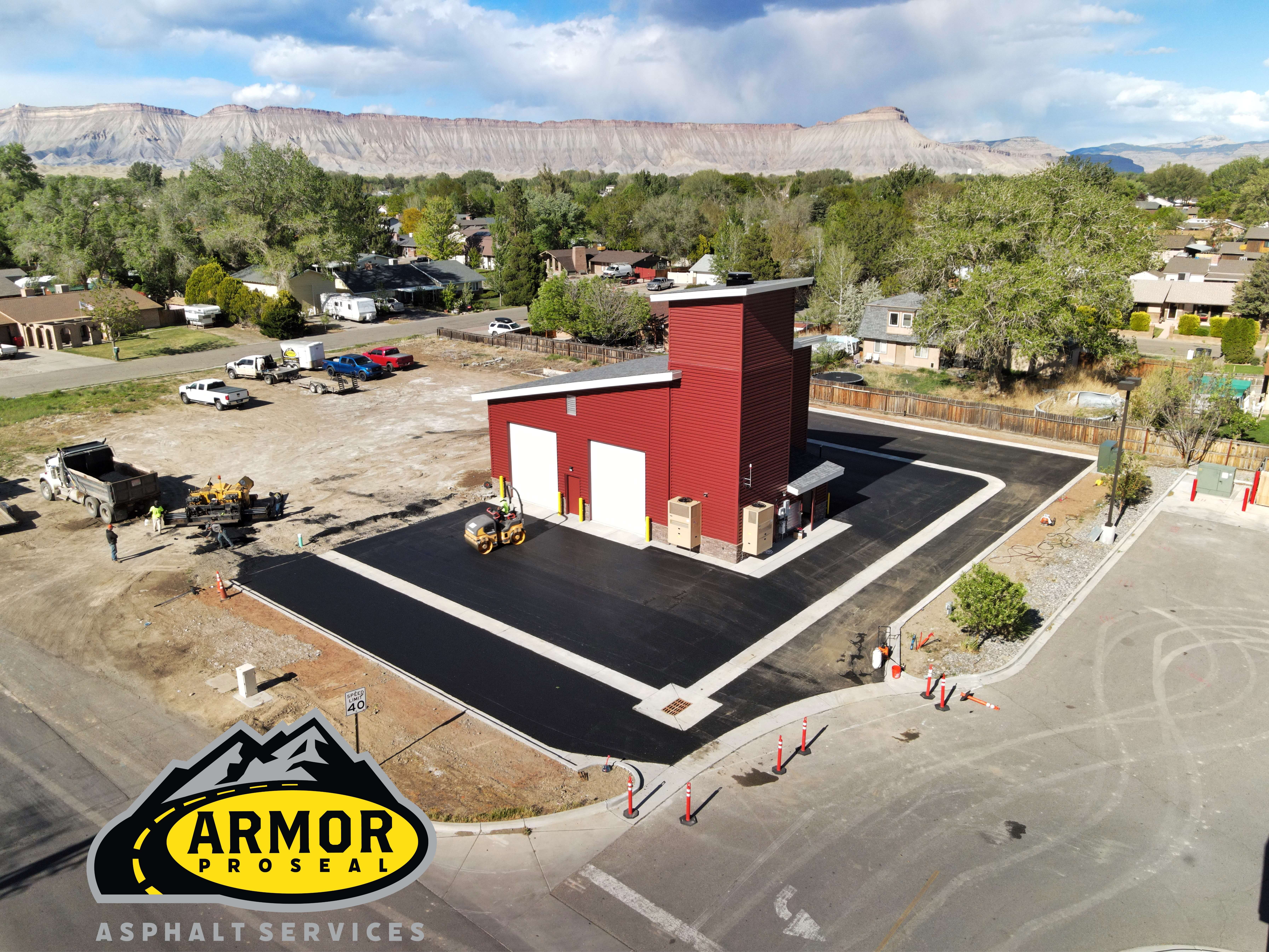 Armor Proseal paving equipment working on a mountain road in Telluride, CO, demonstrating specialized techniques for high-altitude asphalt installation in challenging scenic terrain.