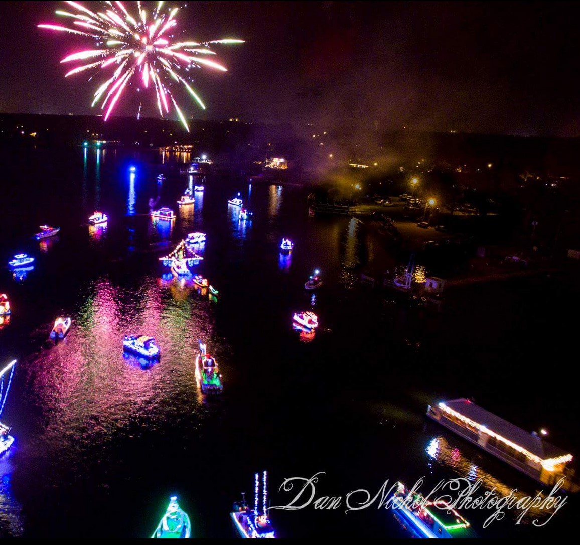 Boats decorated with Christmas lights during Christmas on the Bayou in Gulfport, Mississippi