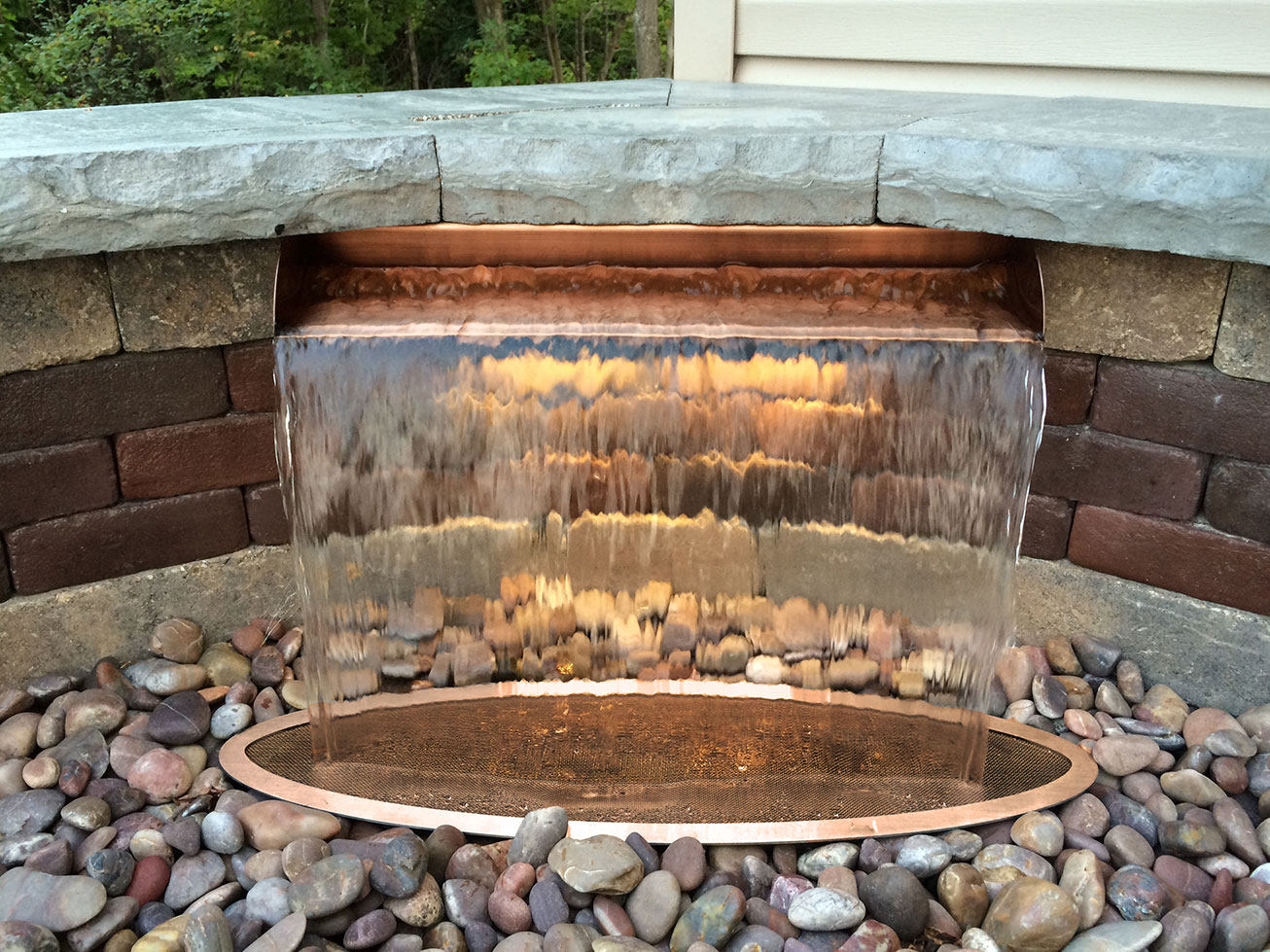 Outdoor shear curtain waterfall scupper for Brunswick landscape backyard patio