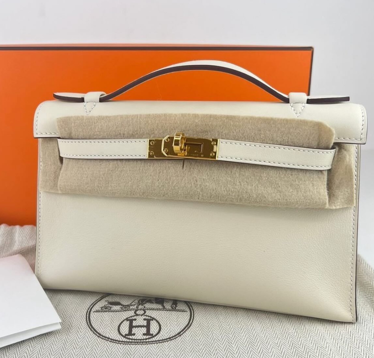 Cream Kelly Pouchette Handbag Insurance