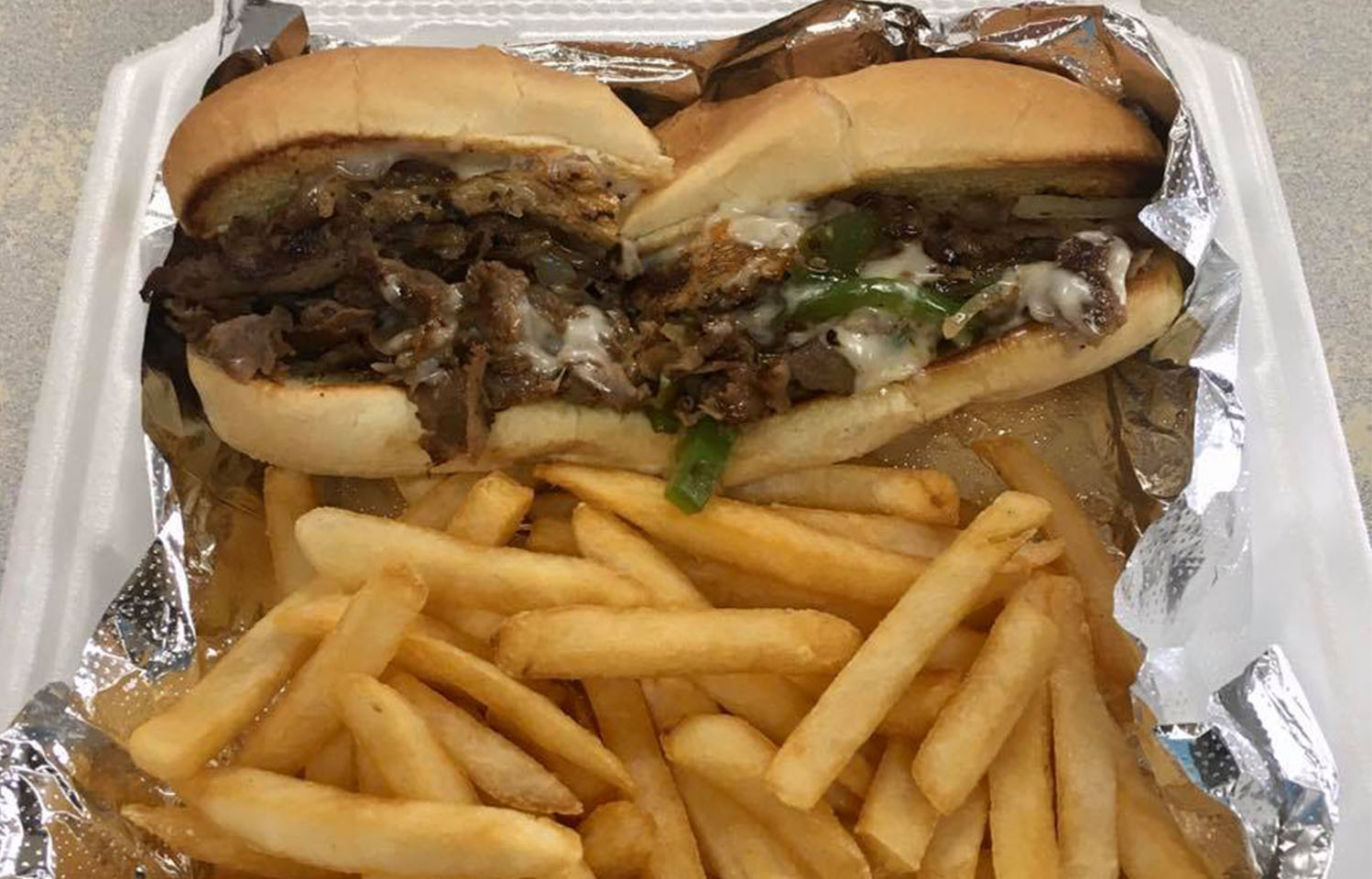 Visit Angelo’s Pizza & Steakhouse for Delicious Steak, Sandwiches and Pizza in Columbia, MO.