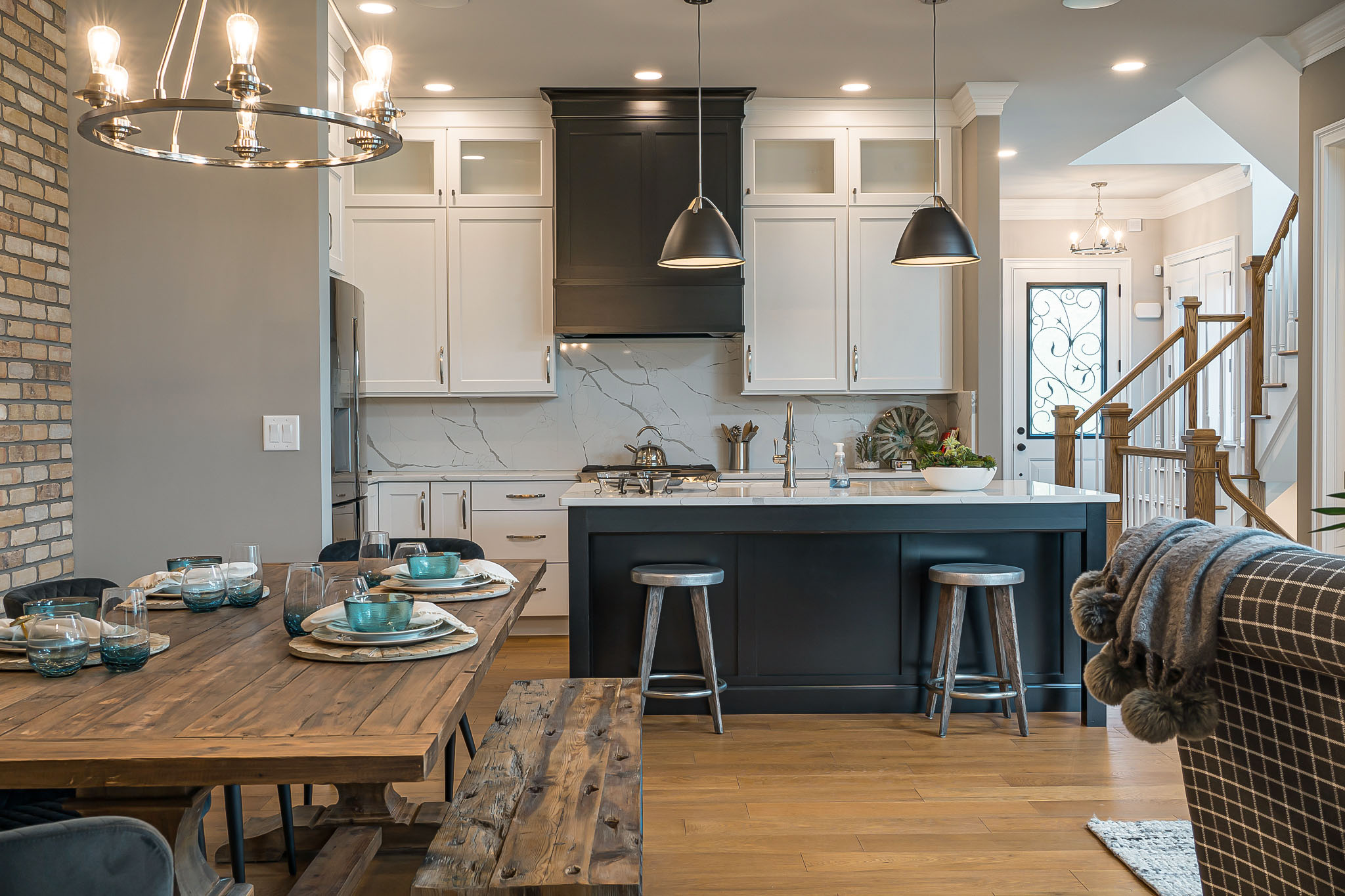 Luxury Townhome - Gourmet kitchen with large working island and white marble backsplash