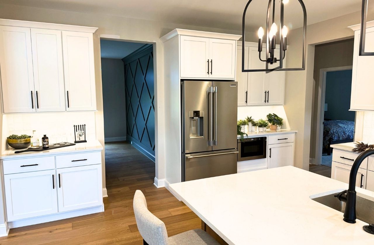 18 Dahlia Drive - Lincoln Ranch - Kitchen featuring tall cabinets, built-in microwave and clean face with under-mount lighting and electrical