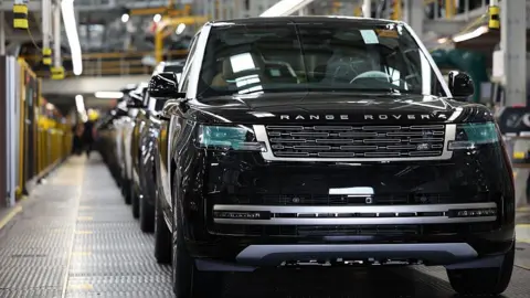 Jaguar Land Rovers in a line