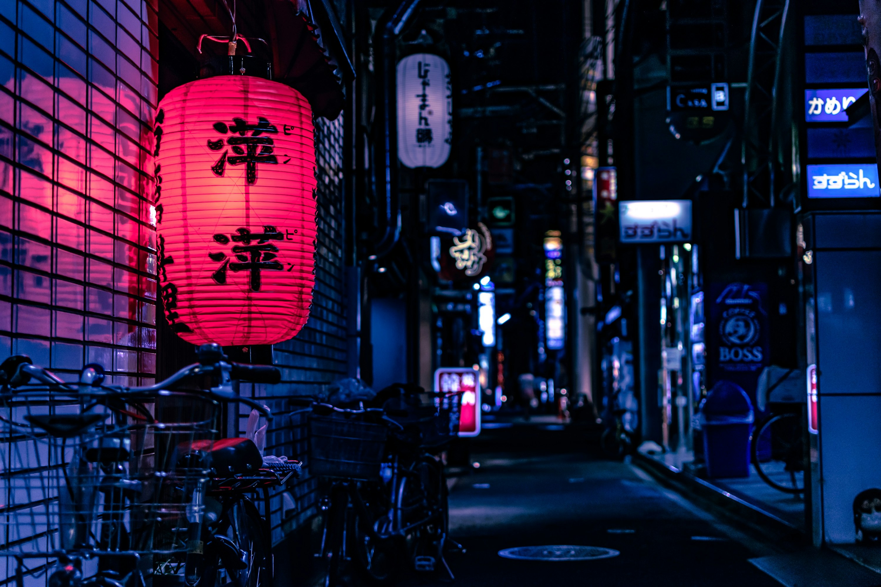 Narrow Japanese alley at night