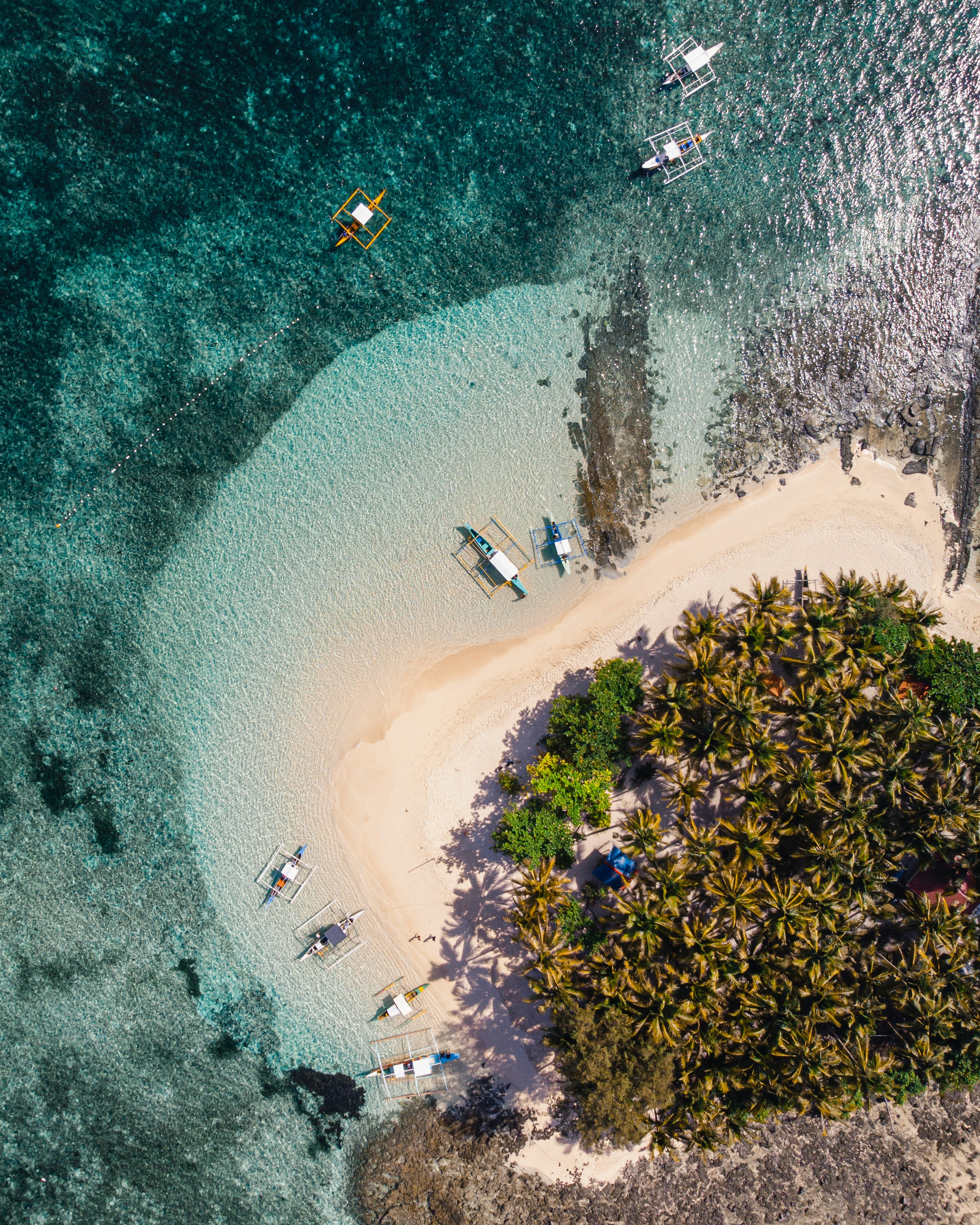Aerial view of tropical beach and boats in the Philippines