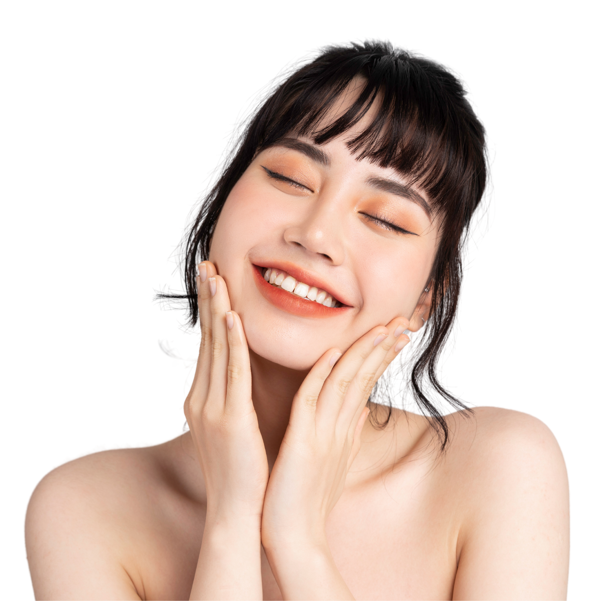 A woman with long hair is smiling with her hands on her face.