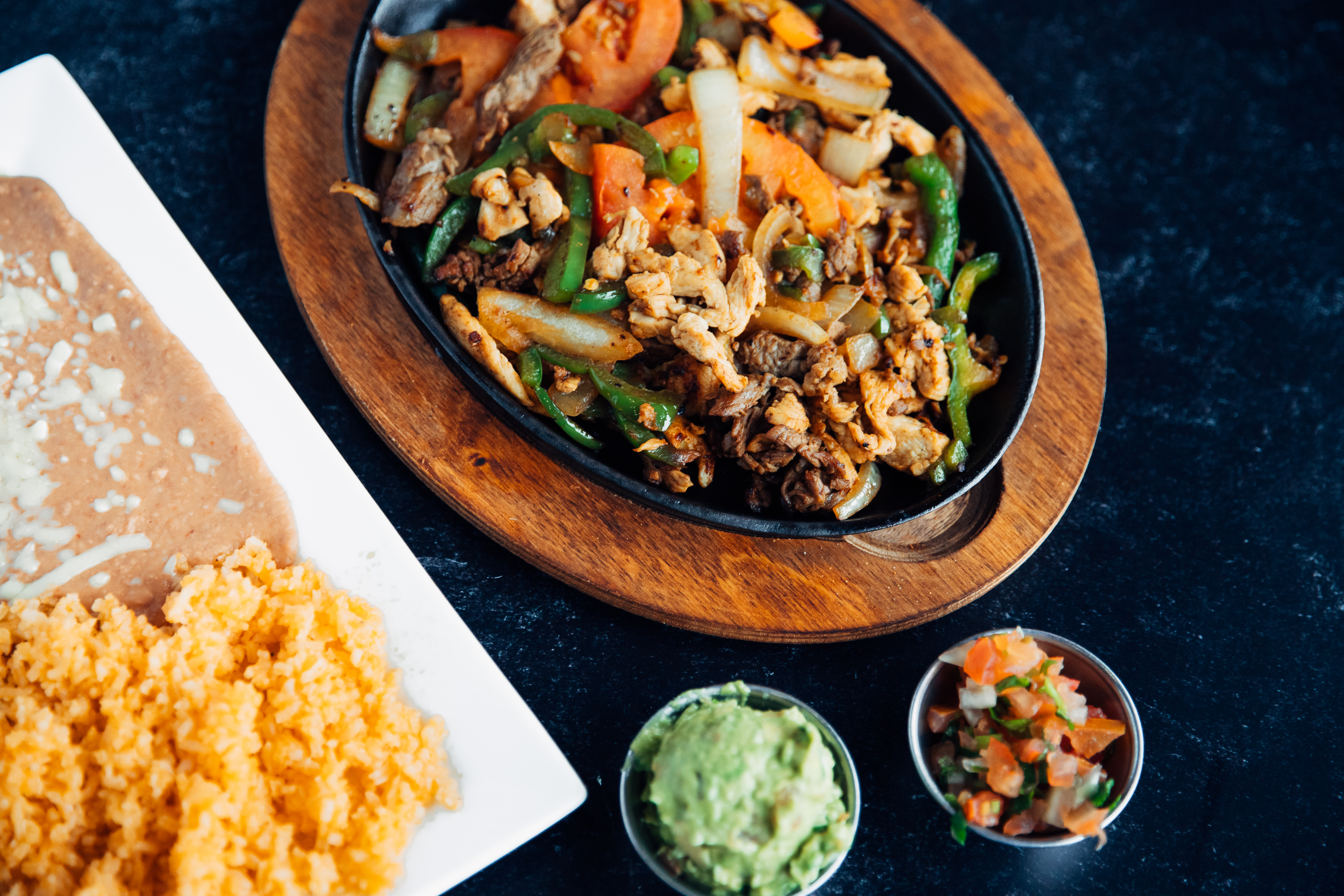 Order fresh & delicious pizza at Deuce Pub & Pit in Columbia, MO.