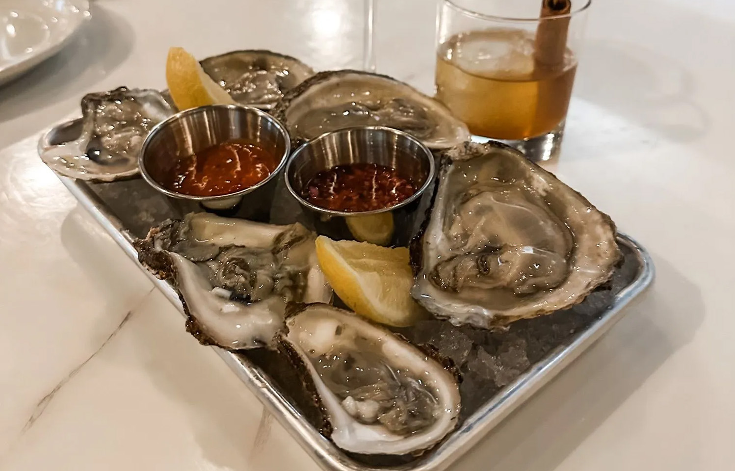 Grab a Cocktail After Work at Belly Market & Rotisserie in Columbia, MO.