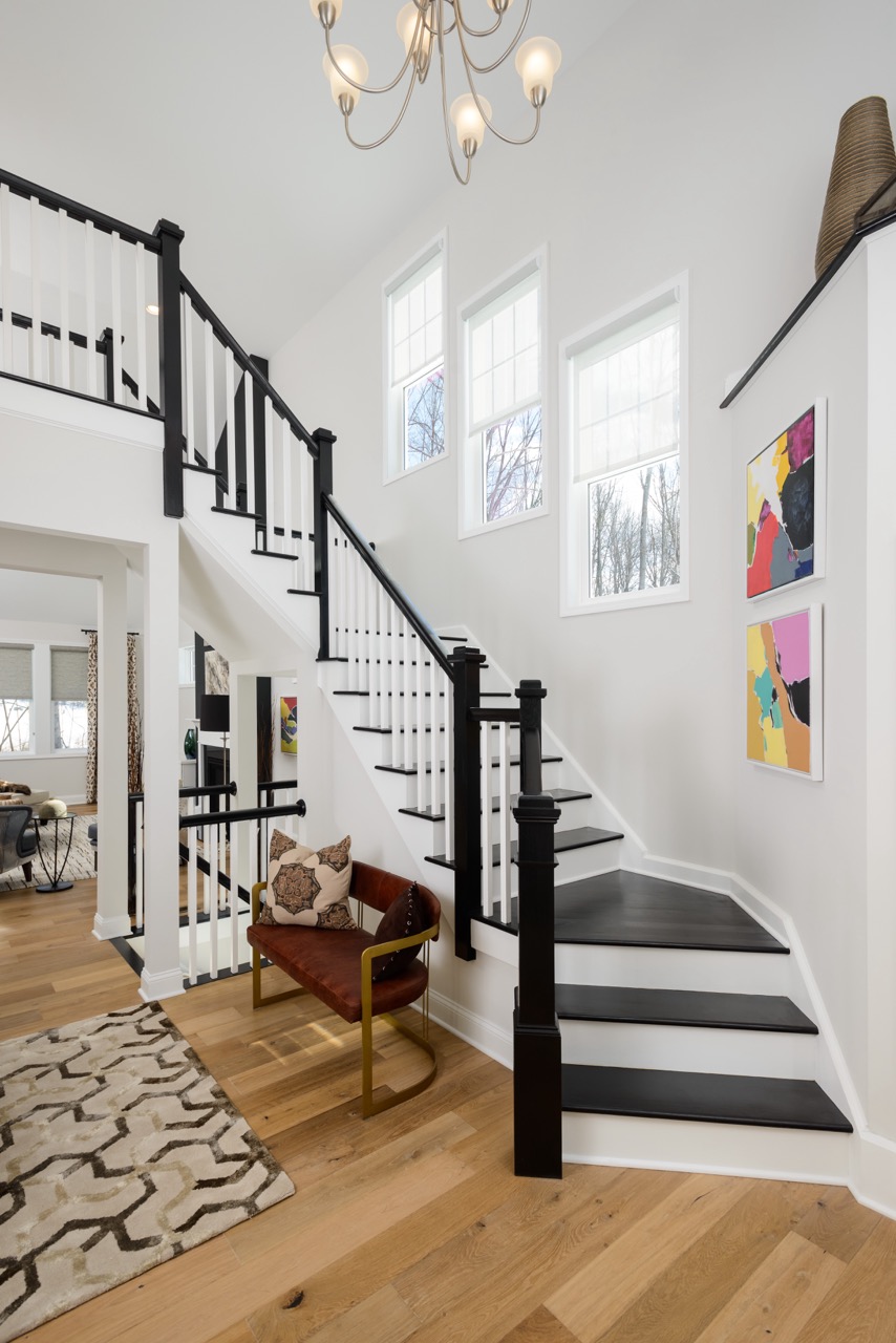 5 Greenbrier Way - Chesapeake Primary Down - Eye-catching black and white open staircase