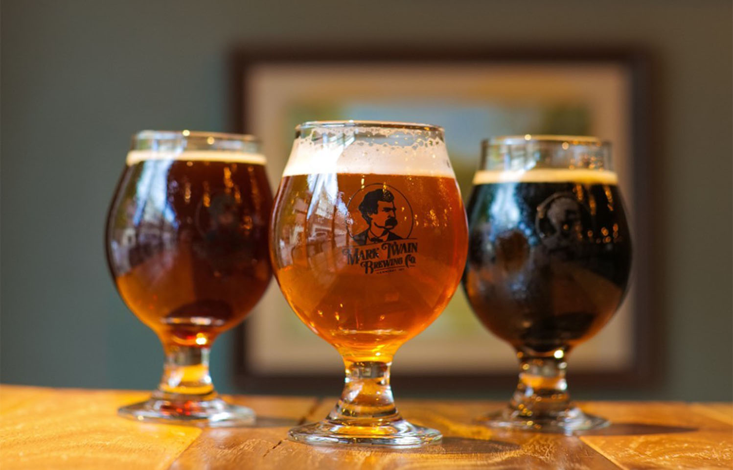 Grab a drink and enjoy a cheese plate at Twain in Columbia, MO.