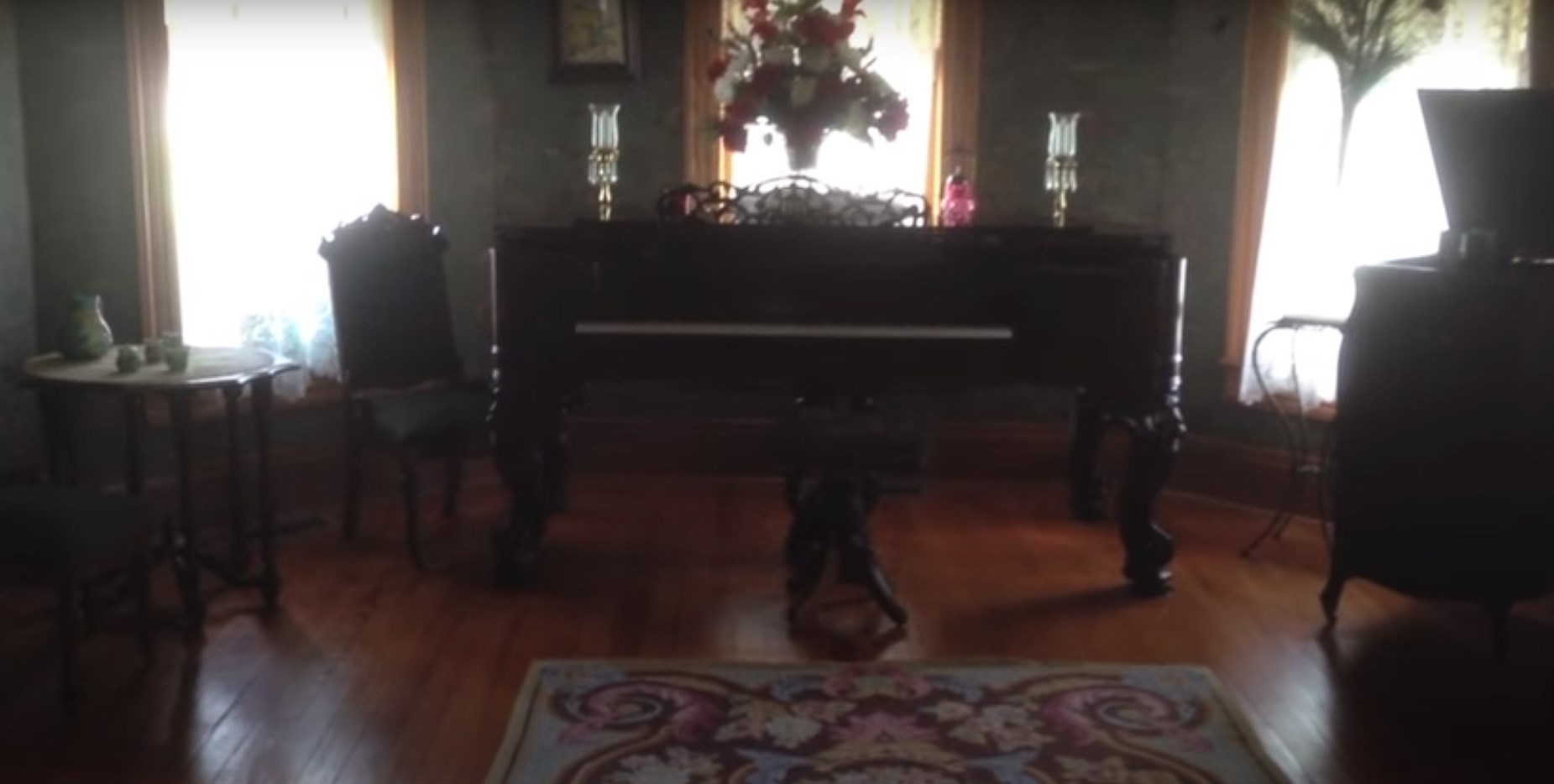 Sitting room with piano in Bayless Selby House Museum Denton, TX