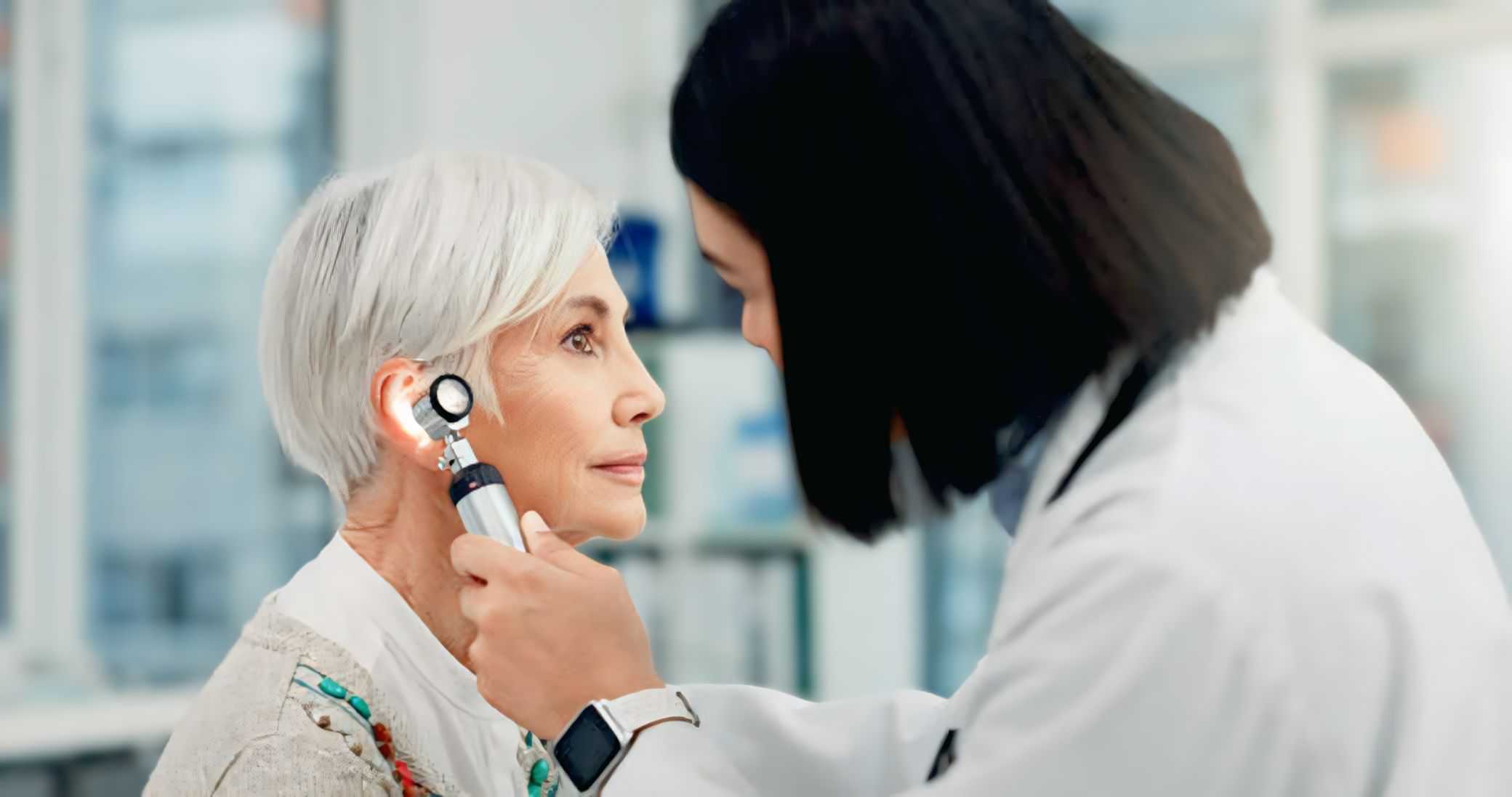 Doctor Checking Patient's ear