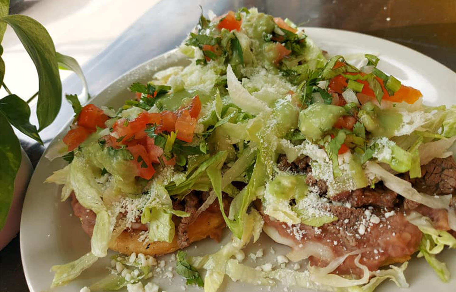 Order fresh & delicious pizza at Deuce Pub & Pit in Columbia, MO.