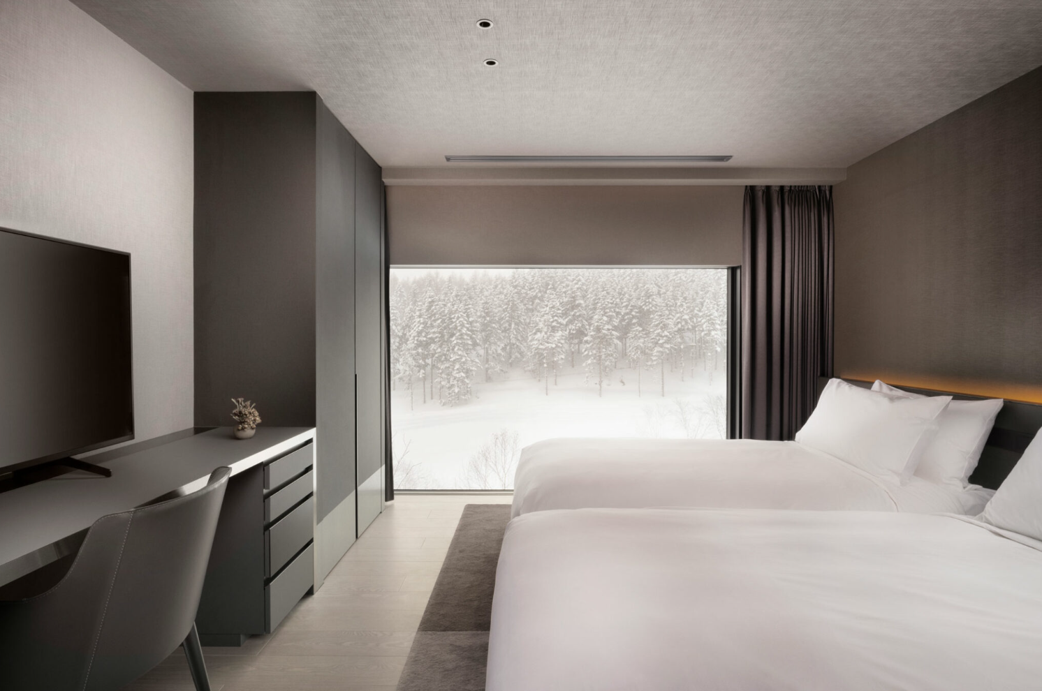 Sansui Niseko - Luxury ski hotel gallery image 12 showing alpine architecture, interior design, or mountain views