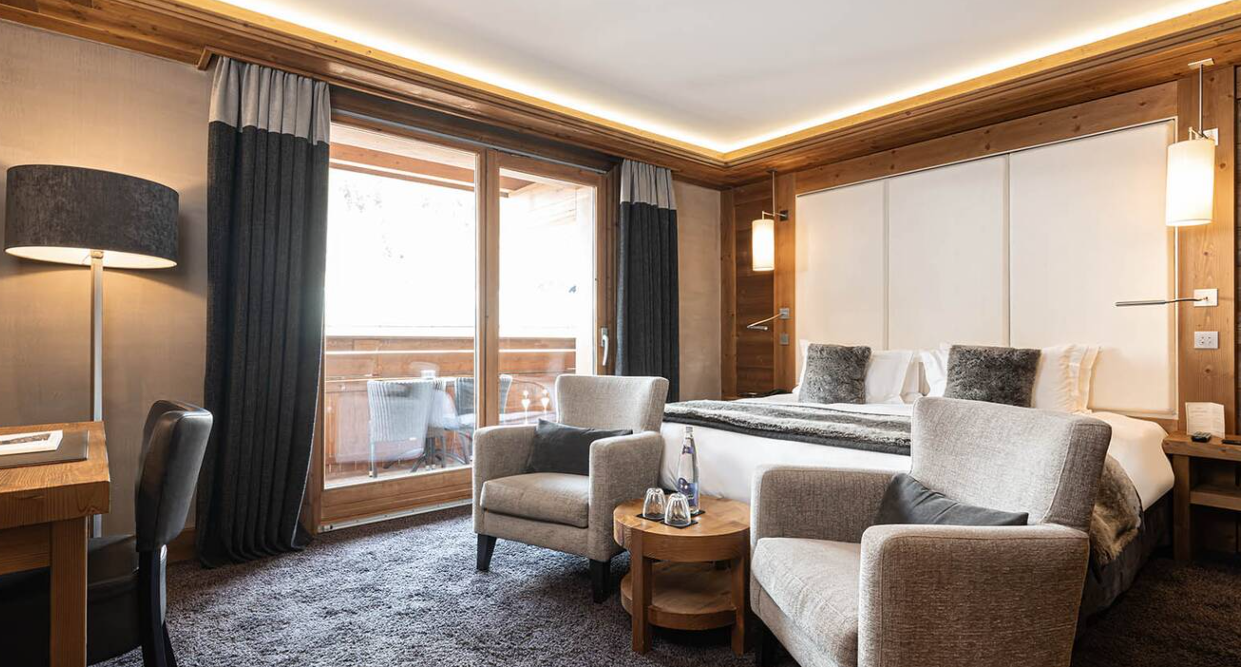 Le Kaïla - Luxury ski hotel gallery image 13 showing alpine architecture, interior design, or mountain views