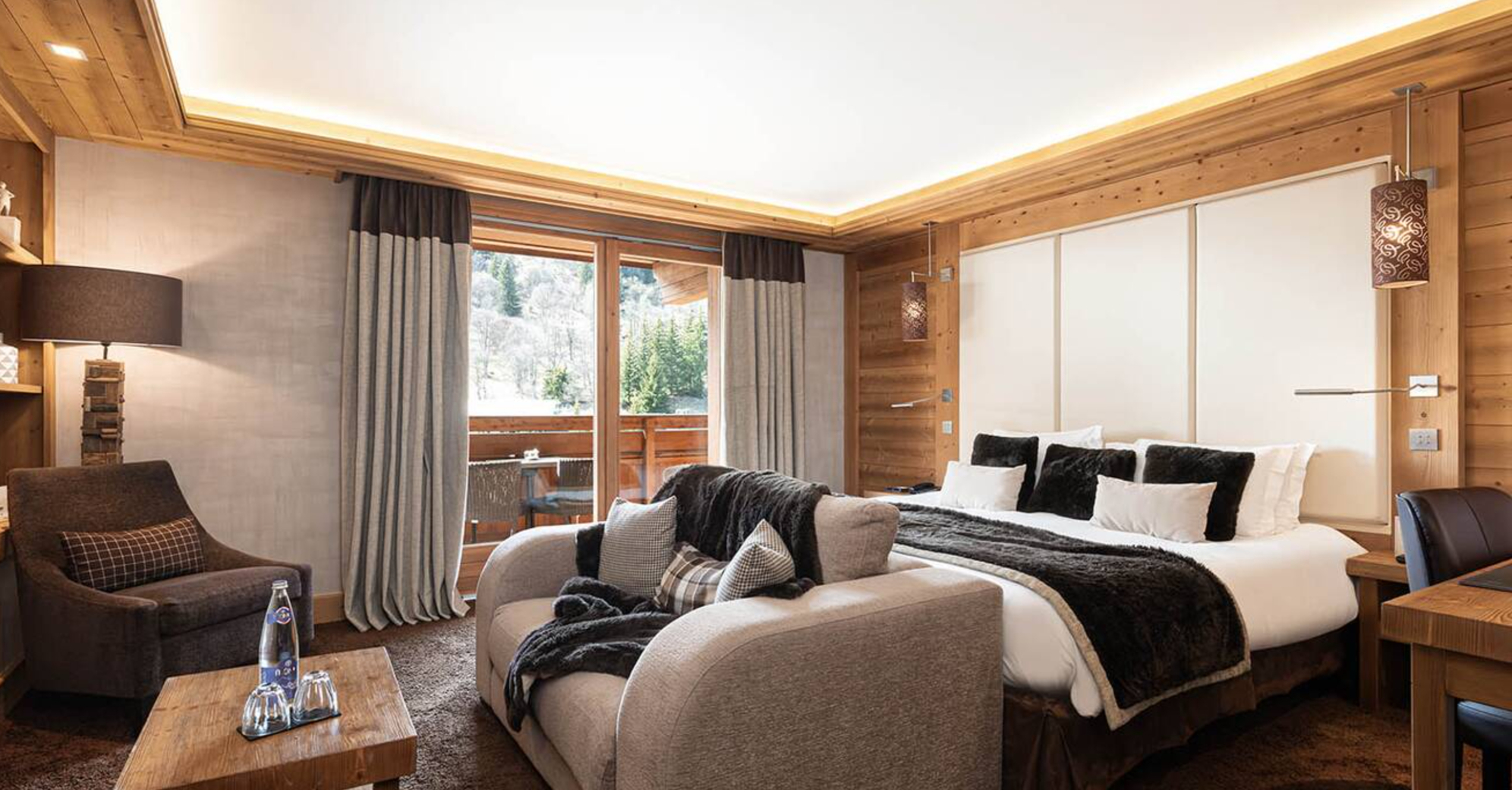 Le Kaïla - Luxury ski hotel gallery image 15 showing alpine architecture, interior design, or mountain views