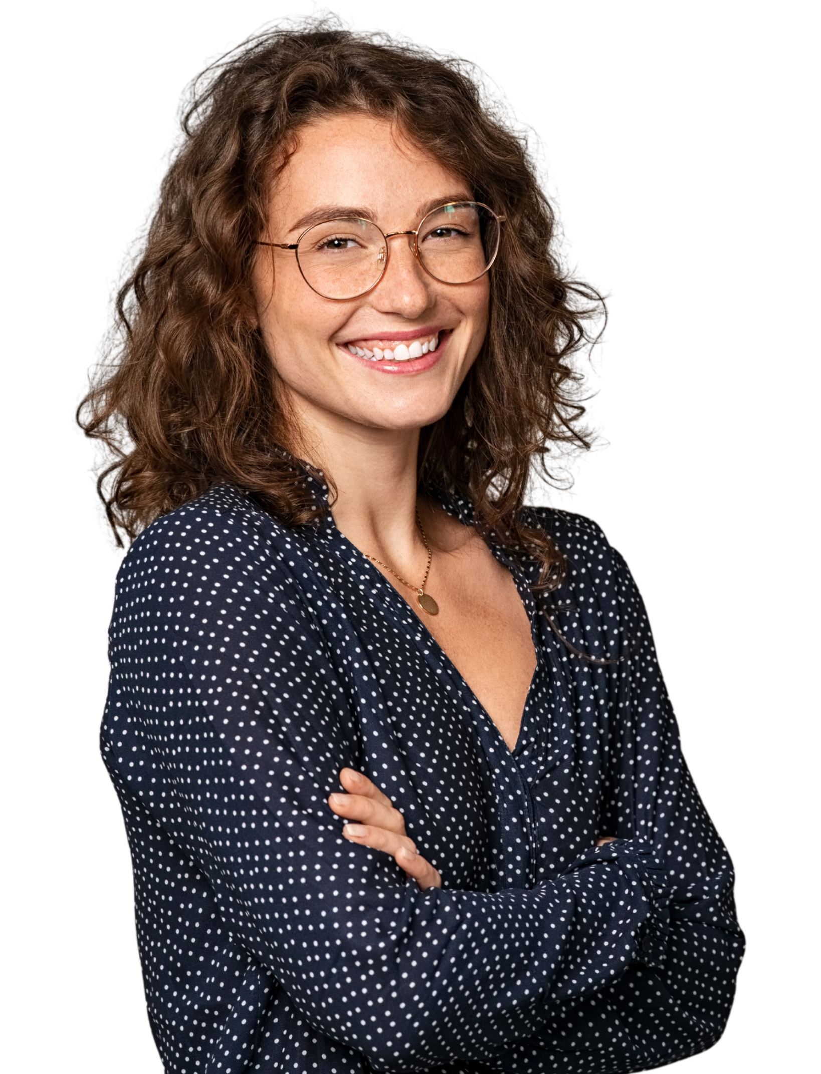A woman in a white shirt is smiling with her hand on her chin