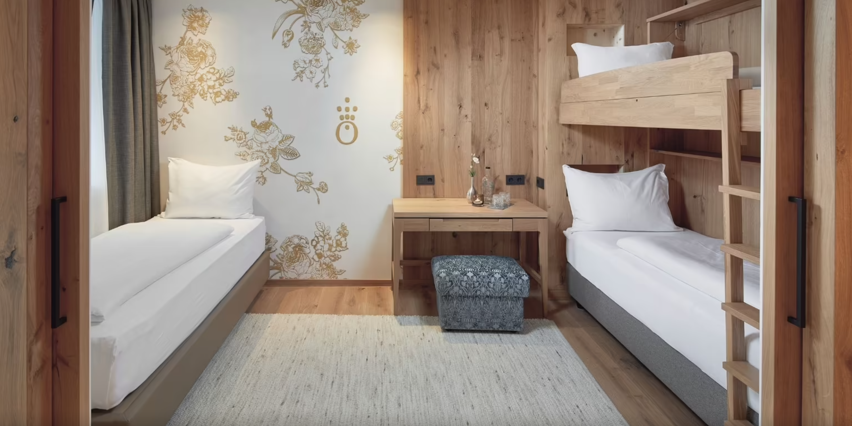 die HOCHKÖNIGIN Mountain Resort - Luxury ski hotel gallery image 10 showing alpine architecture, interior design, or mountain views