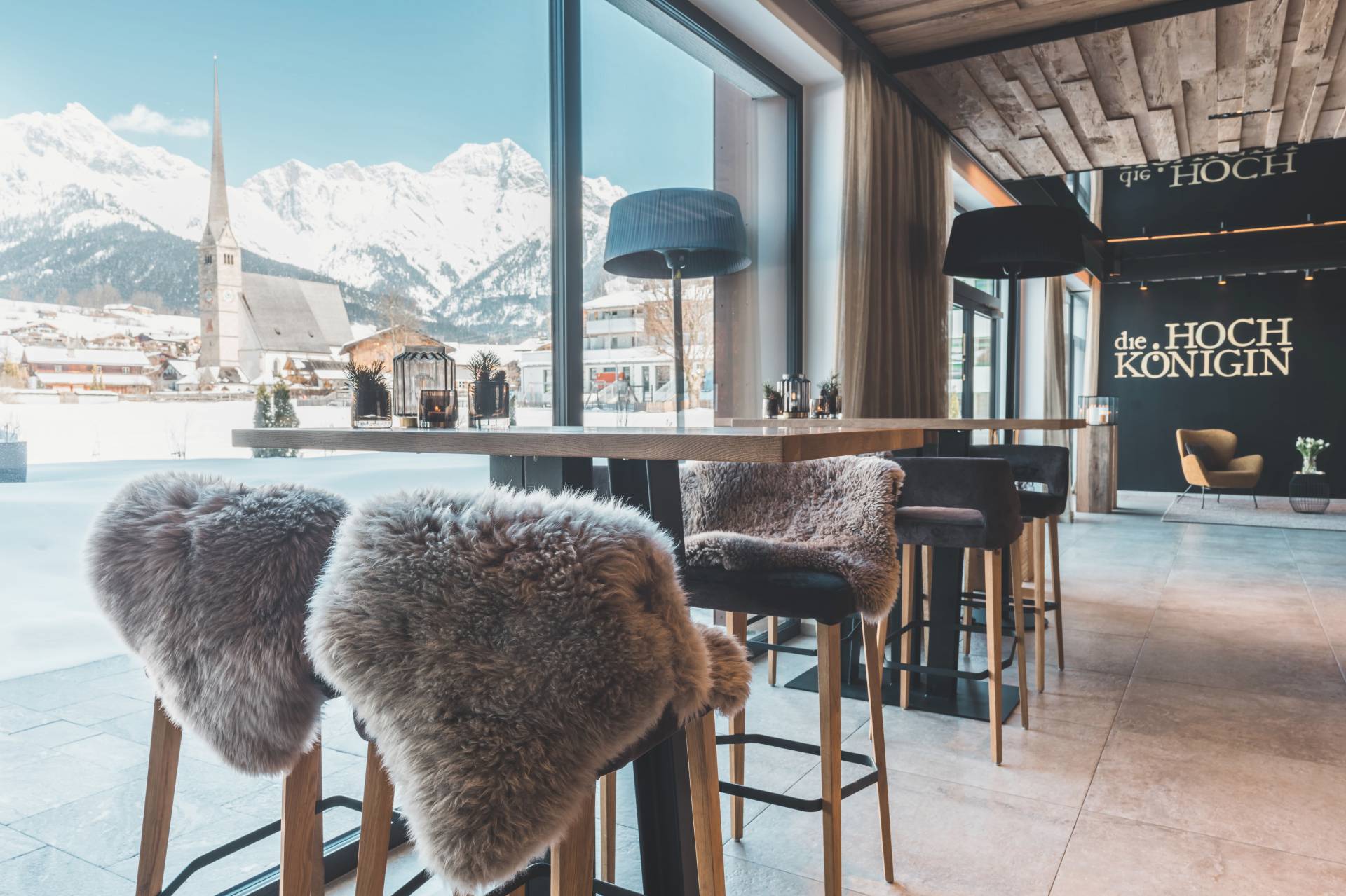 die HOCHKÖNIGIN Mountain Resort - Luxury ski hotel gallery image 16 showing alpine architecture, interior design, or mountain views