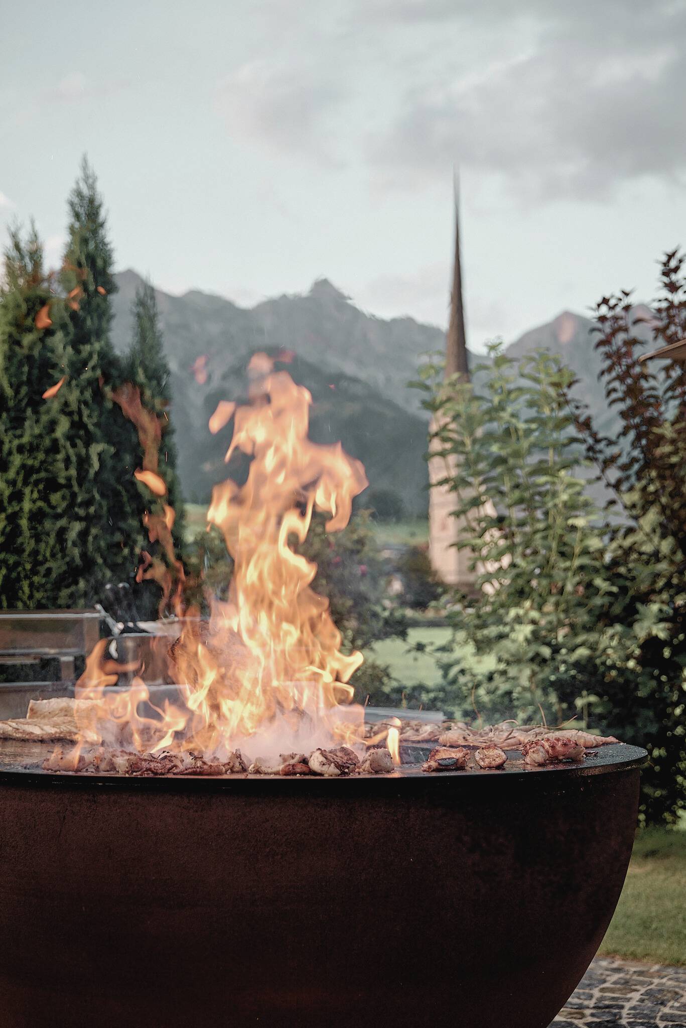 die HOCHKÖNIGIN Mountain Resort - Luxury ski hotel gallery image 22 showing alpine architecture, interior design, or mountain views