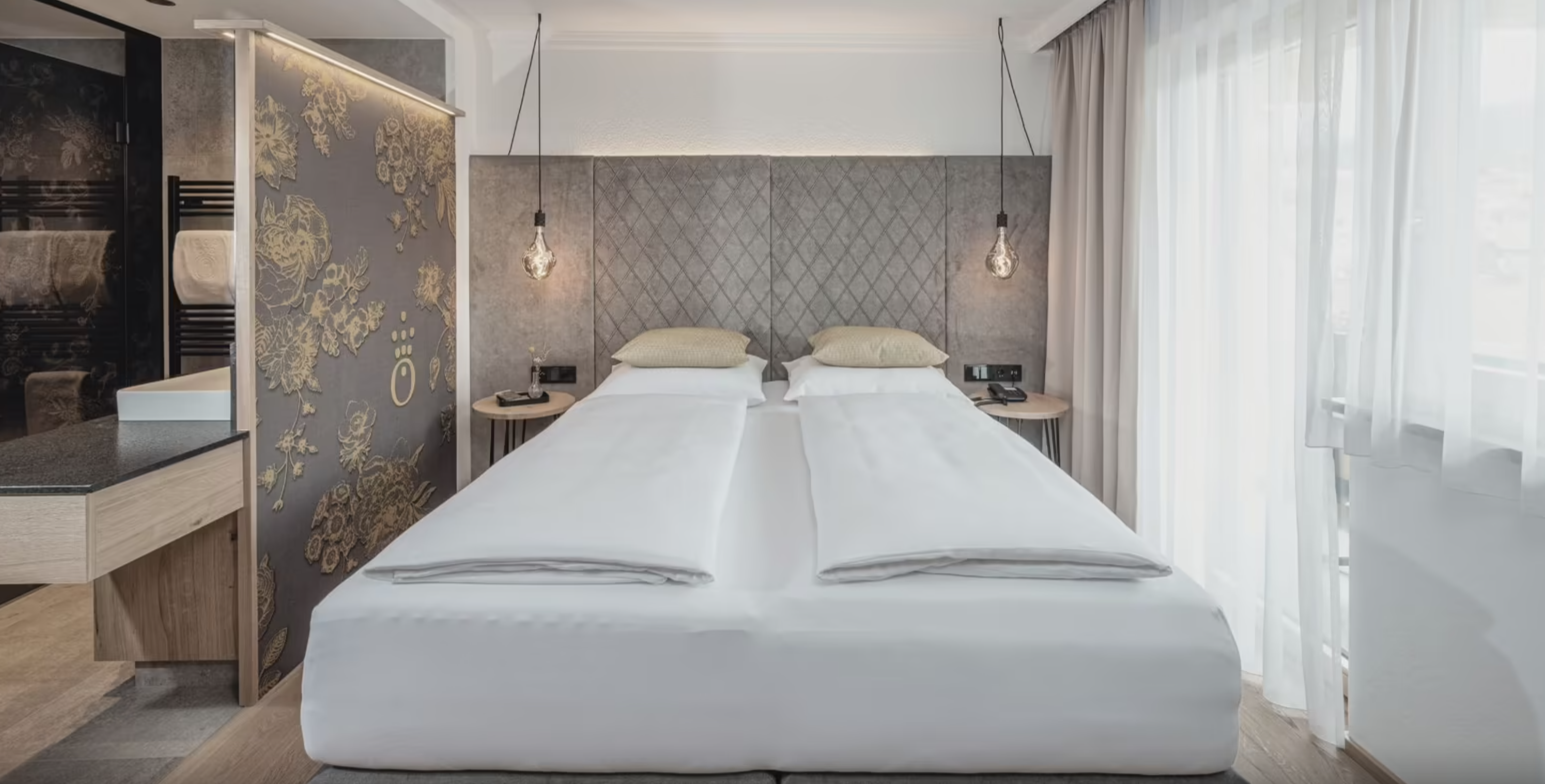 die HOCHKÖNIGIN Mountain Resort - Luxury ski hotel gallery image 4 showing alpine architecture, interior design, or mountain views