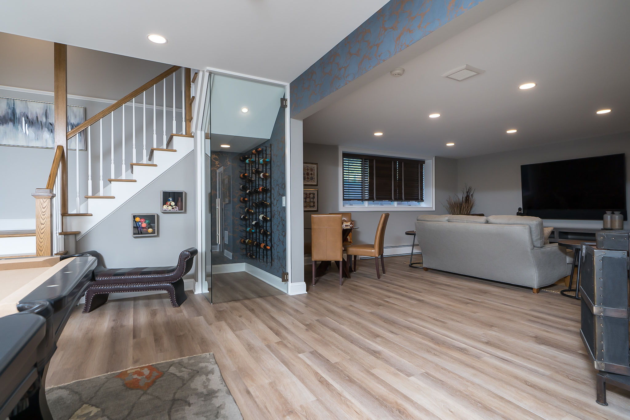 Luxury Townhome - Large egress windows & 9 foot ceilings provide light and height to lower level game room