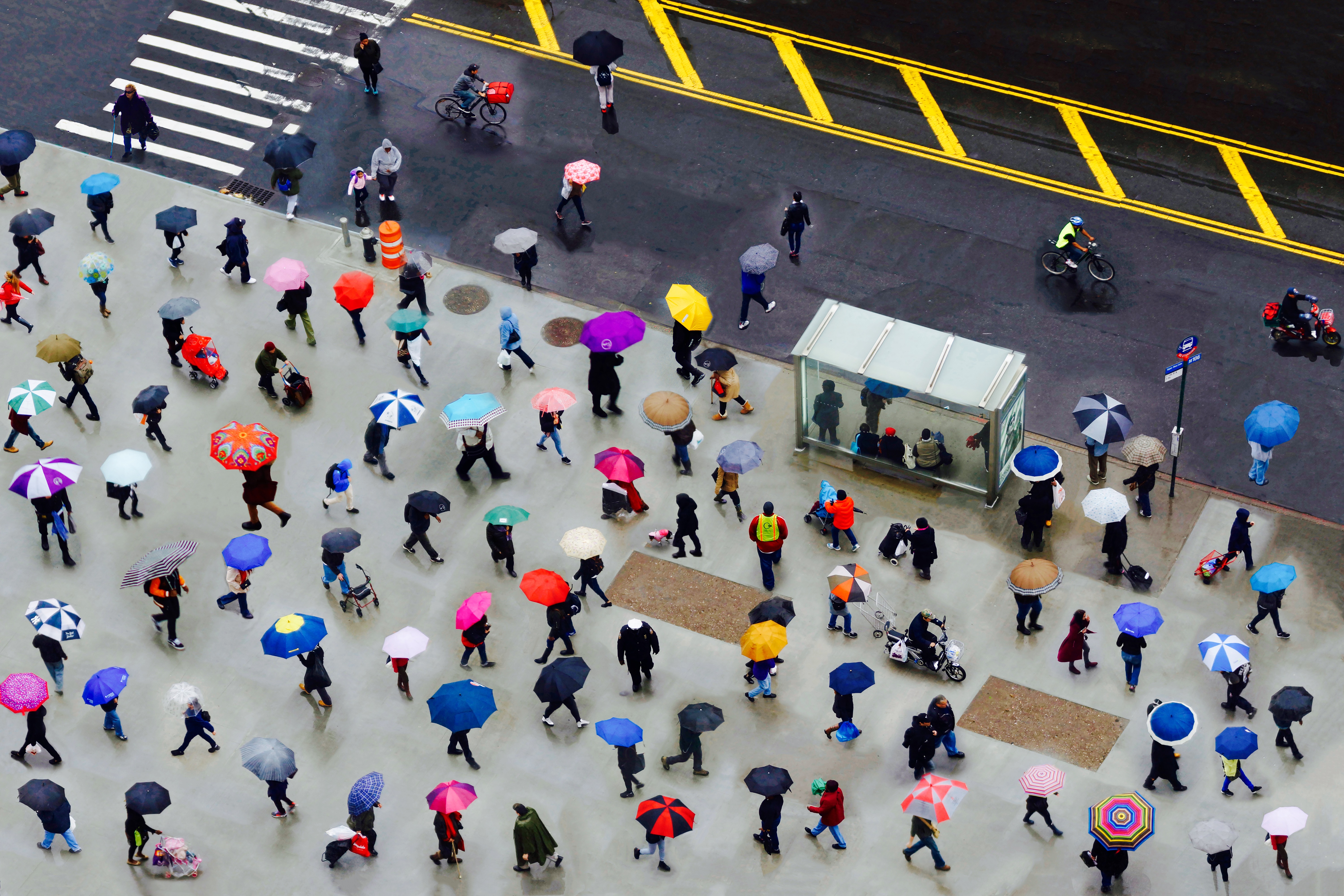 people-walking-with-umbrellas-road.jpg