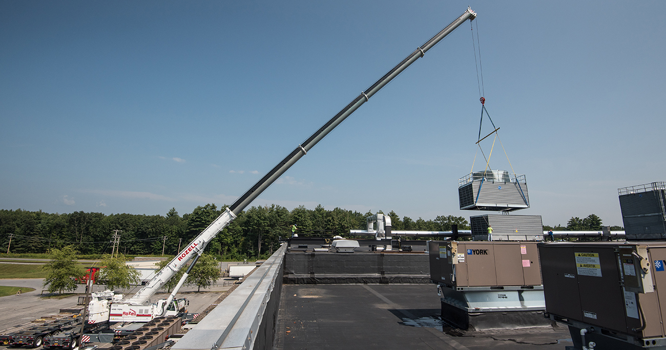 CRANE RENTAL AND COOLING UNIT INSTALLATION