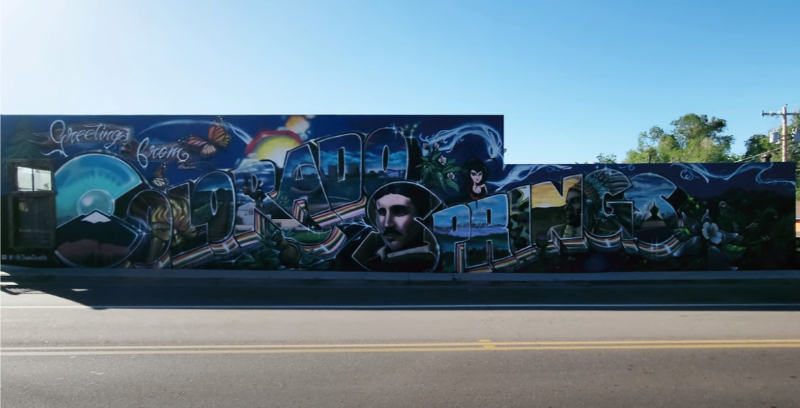 Love is Blinds (719) 748-6777 Mural on Building Greetings from Colorado Springs