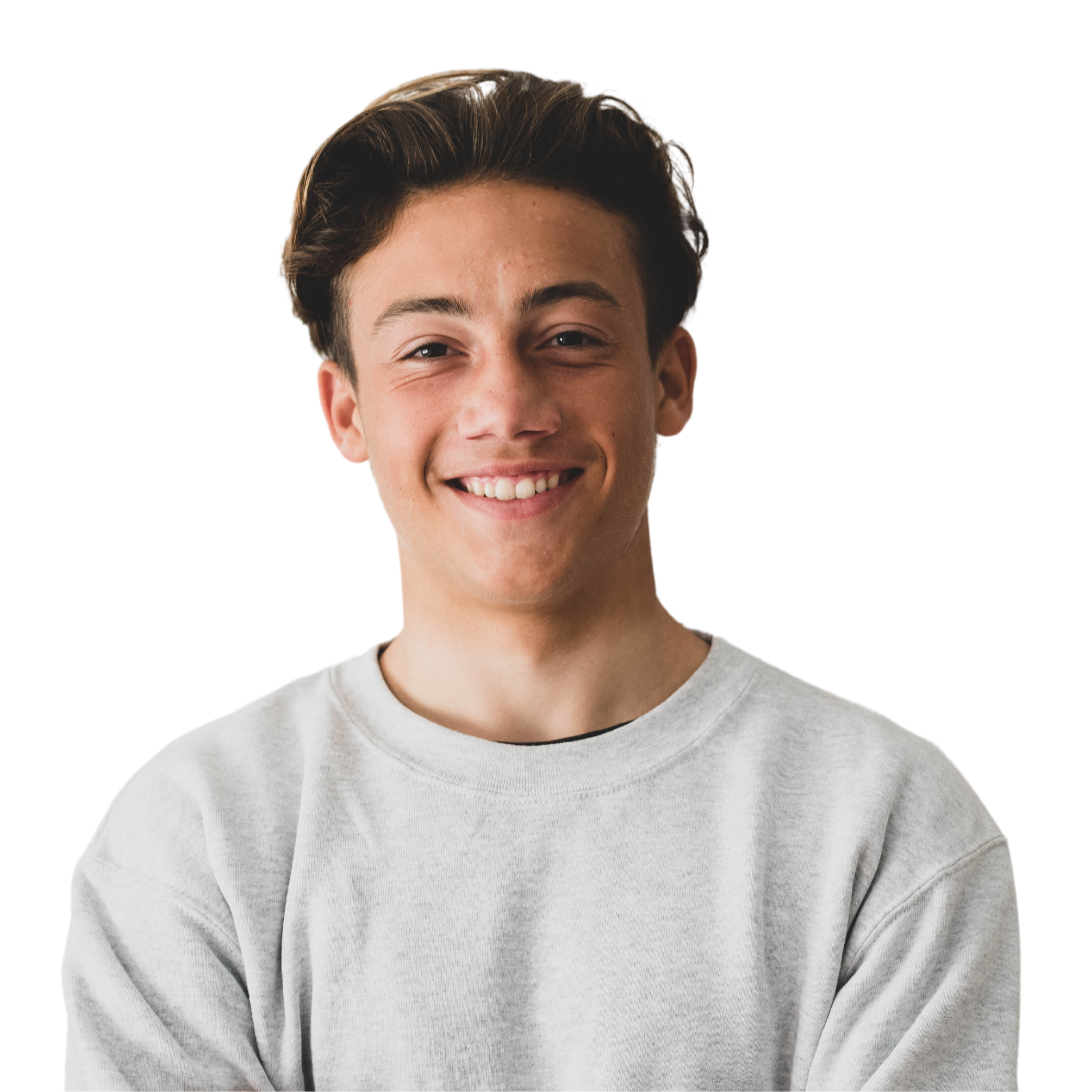 A woman with long hair is smiling with her hands on her face.