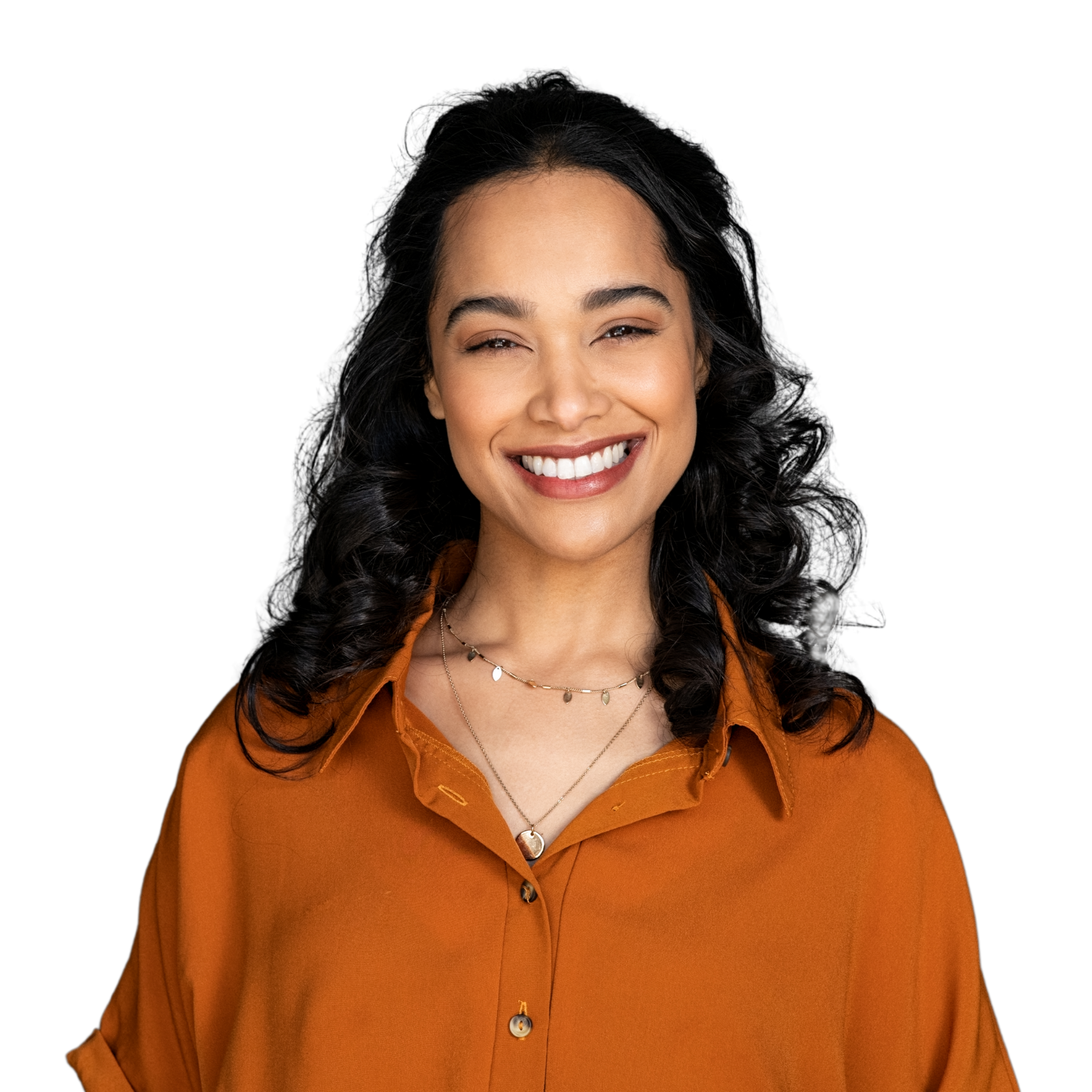 A woman with long hair is smiling with her hands on her face.