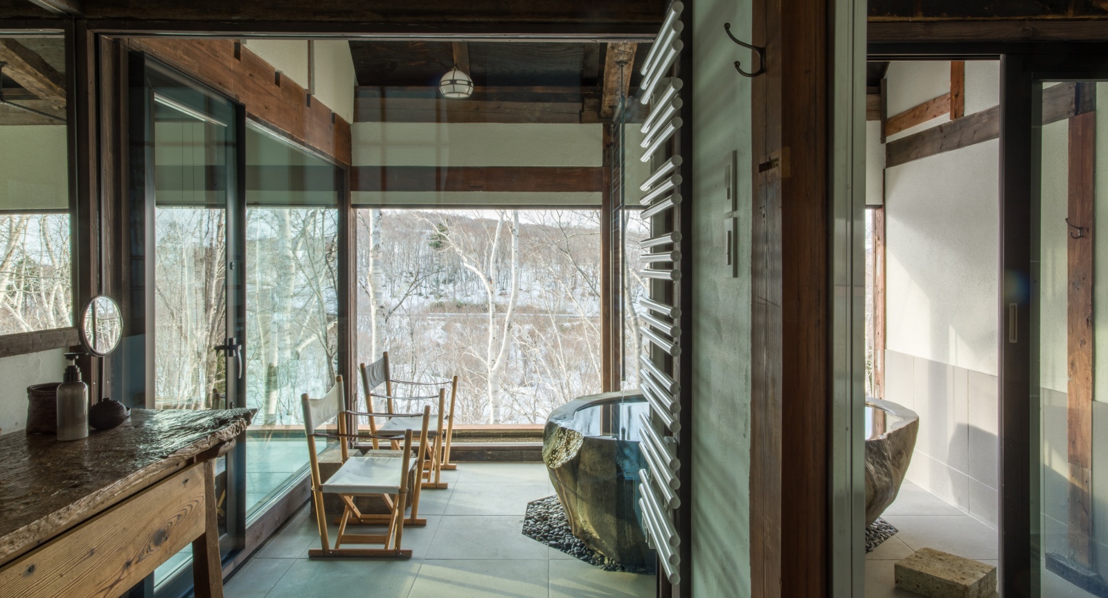 Shiguchi - Luxury ski hotel gallery image 14 showing alpine architecture, interior design, or mountain views