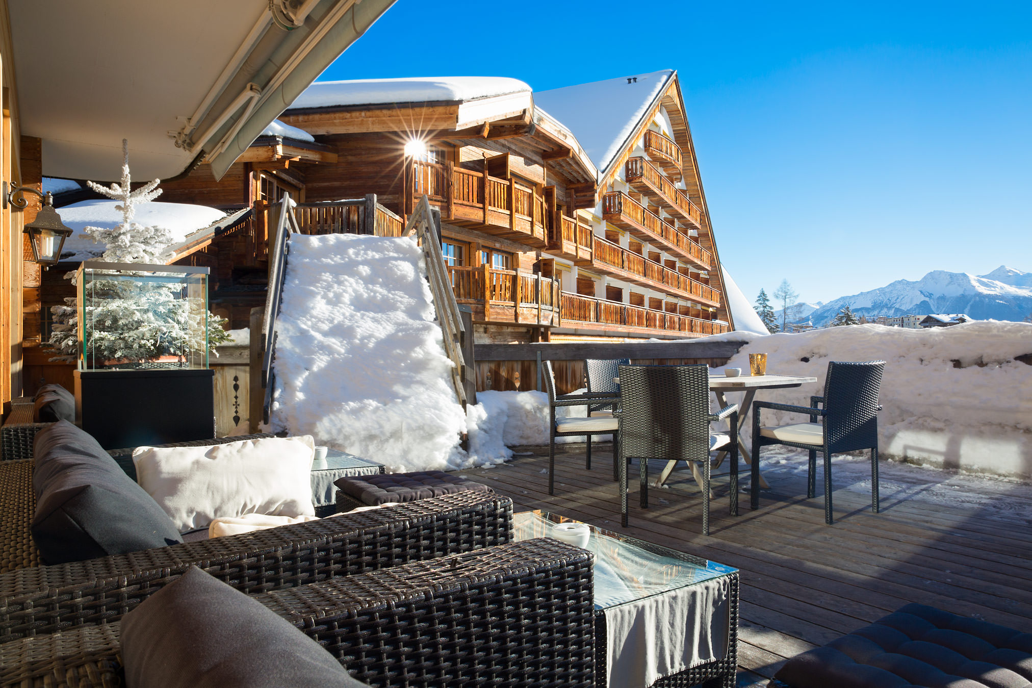 Hostellerie du Pas de l’Ours - Luxury ski hotel gallery image 10 showing alpine architecture, interior design, or mountain views