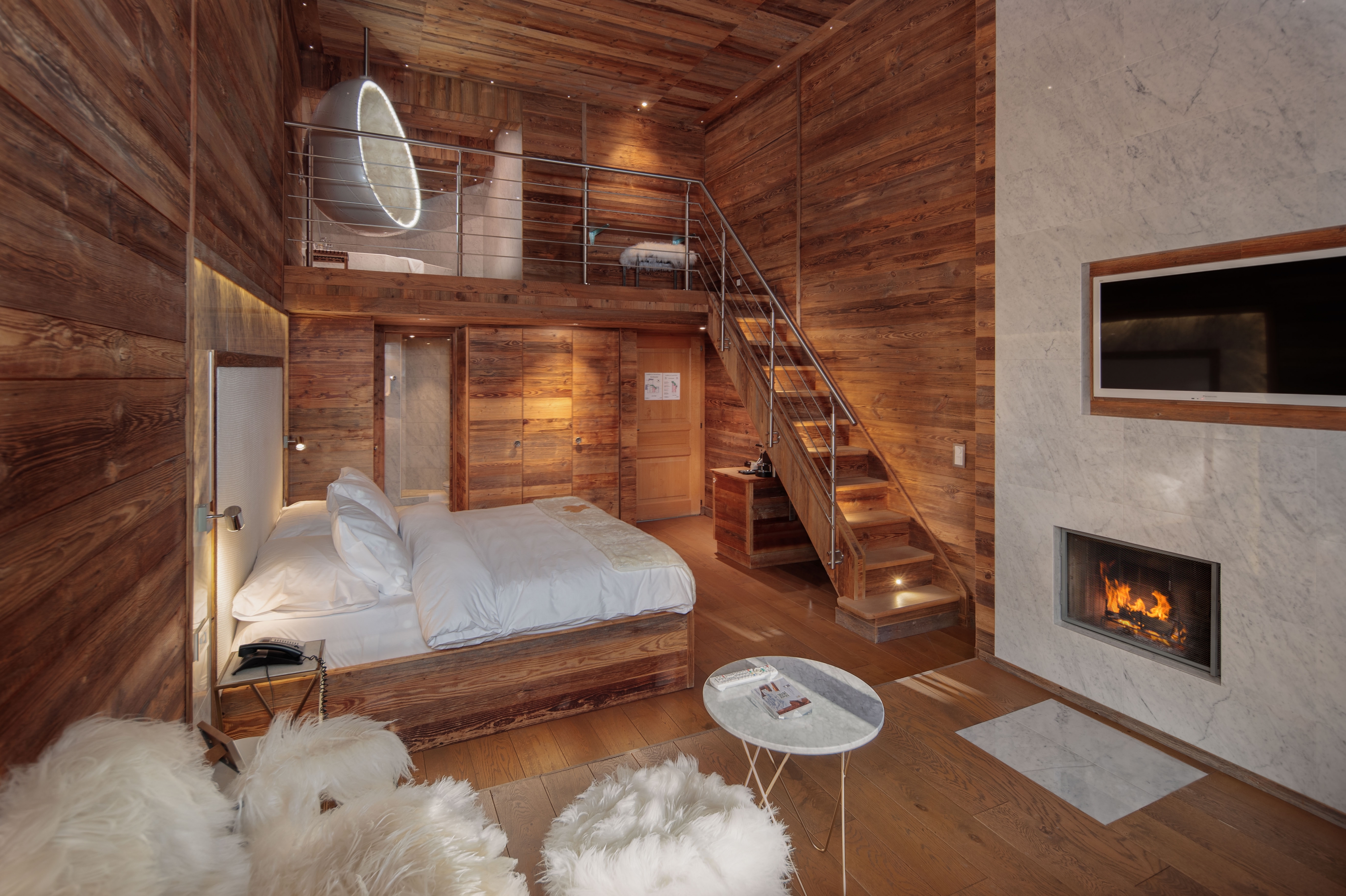 Hostellerie du Pas de l’Ours - Luxury ski hotel gallery image 14 showing alpine architecture, interior design, or mountain views