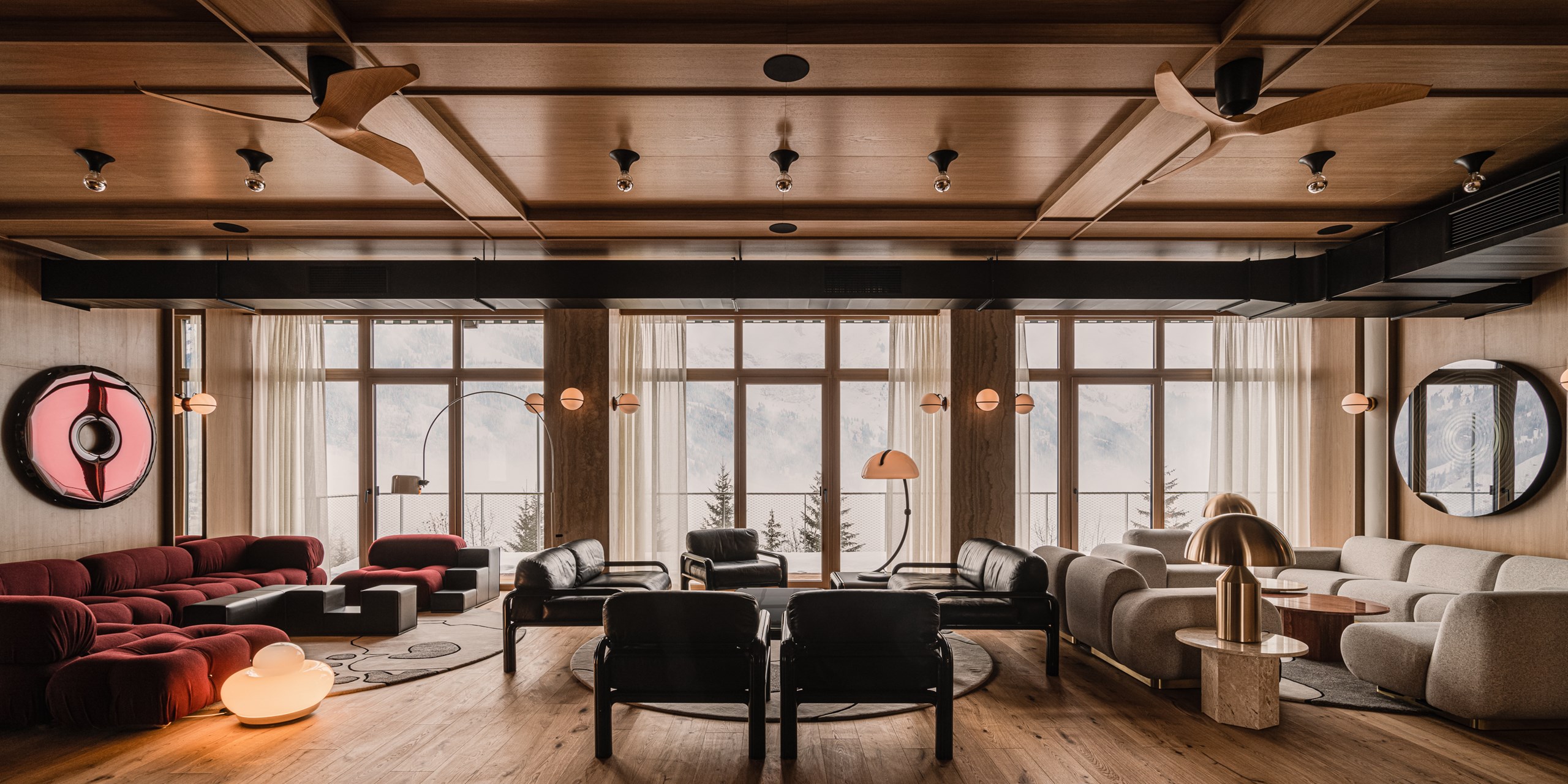 the cōmodo - Luxury ski hotel gallery image 13 showing alpine architecture, interior design, or mountain views