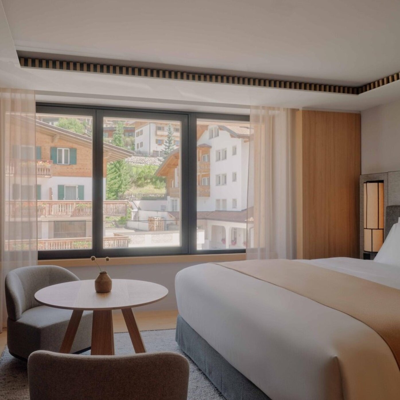 Aman Rosa Alpina - Luxury ski hotel gallery image 5 showing alpine architecture, interior design, or mountain views