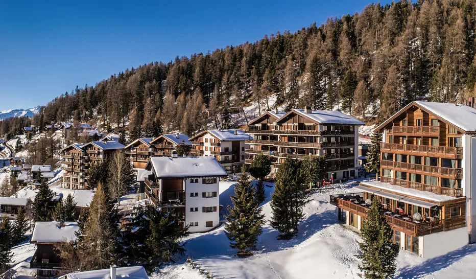 Chandolin Boutique Hotel - Luxury ski hotel gallery image 10 showing alpine architecture, interior design, or mountain views
