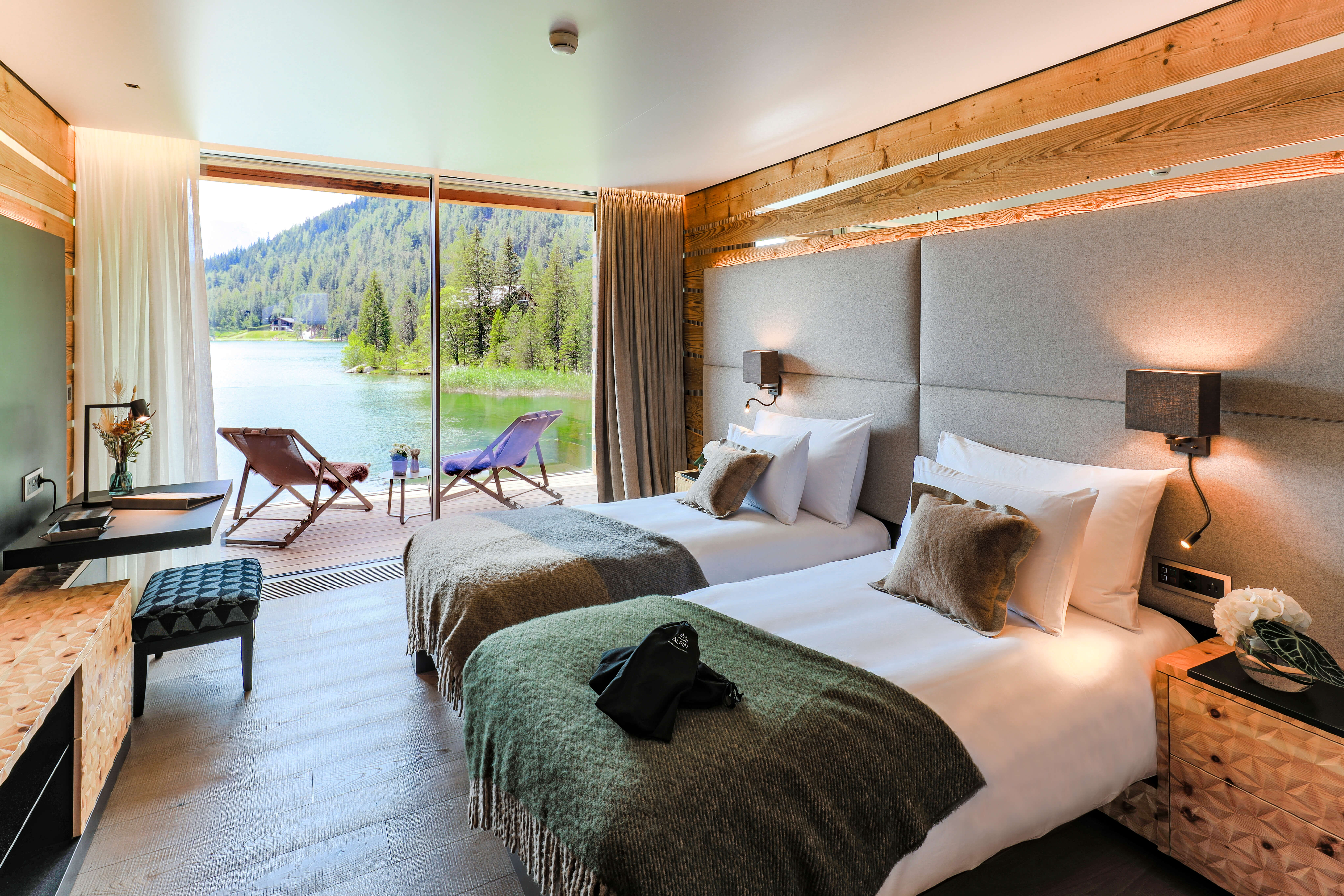 Au Club Alpin - Luxury ski hotel gallery image 8 showing alpine architecture, interior design, or mountain views