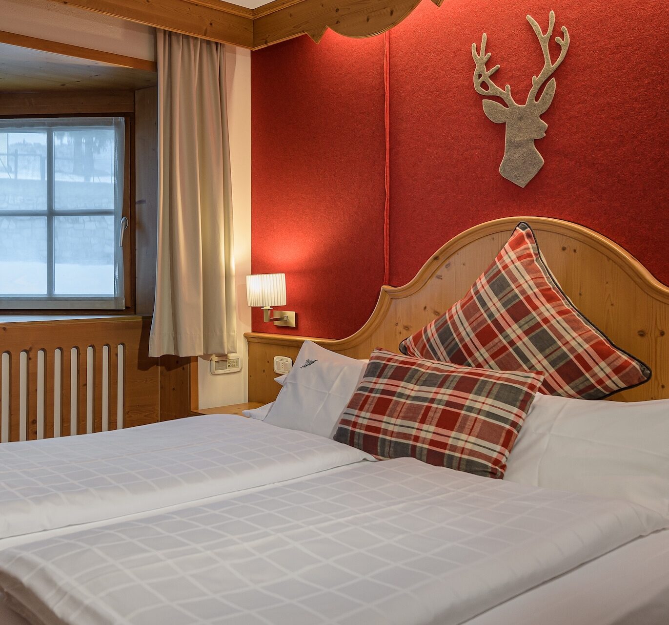 Biohotel Hermitage - Luxury ski hotel gallery image 22 showing alpine architecture, interior design, or mountain views