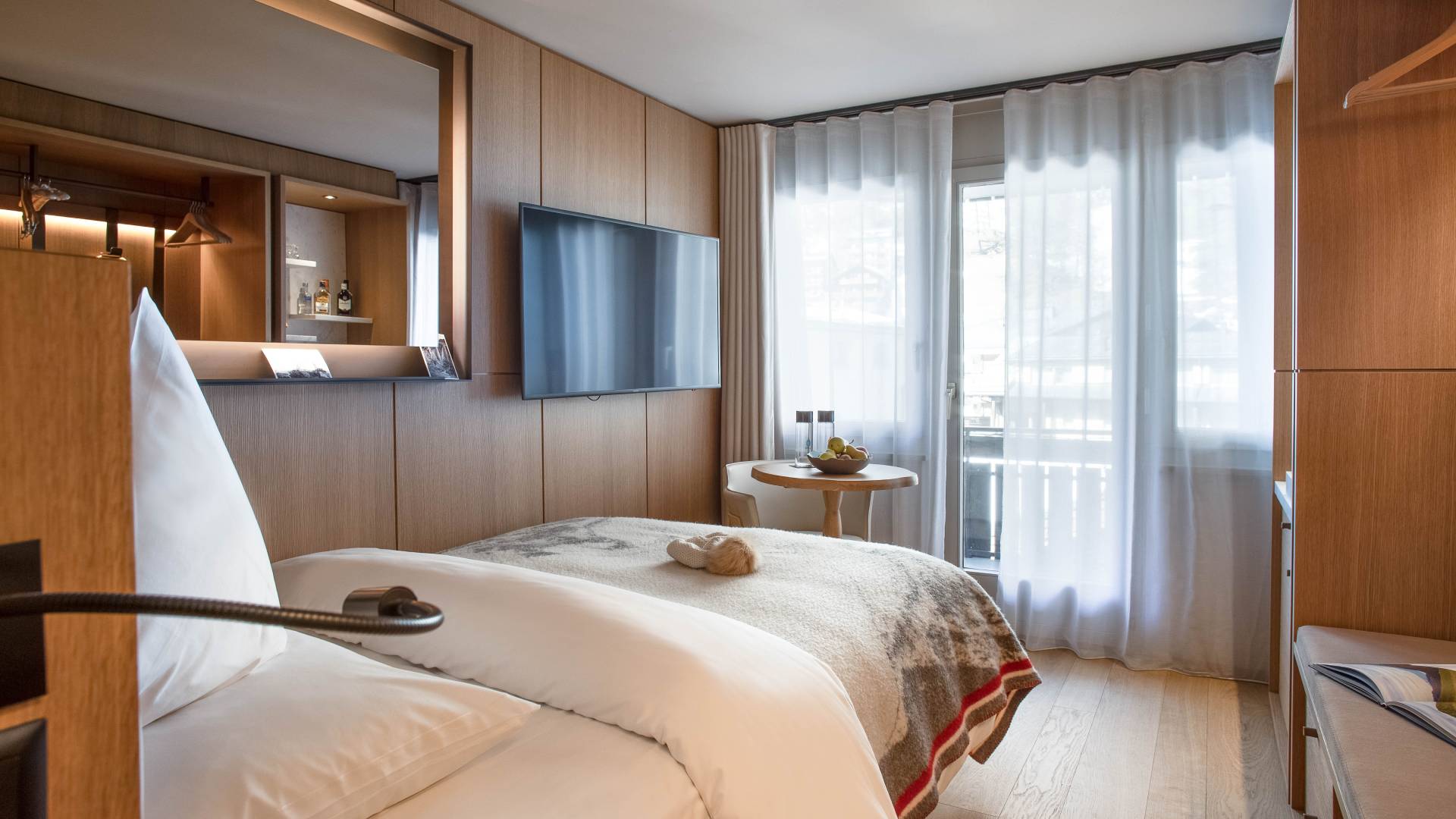 Schweizerhof Zermatt - Luxury ski hotel gallery image 12 showing alpine architecture, interior design, or mountain views