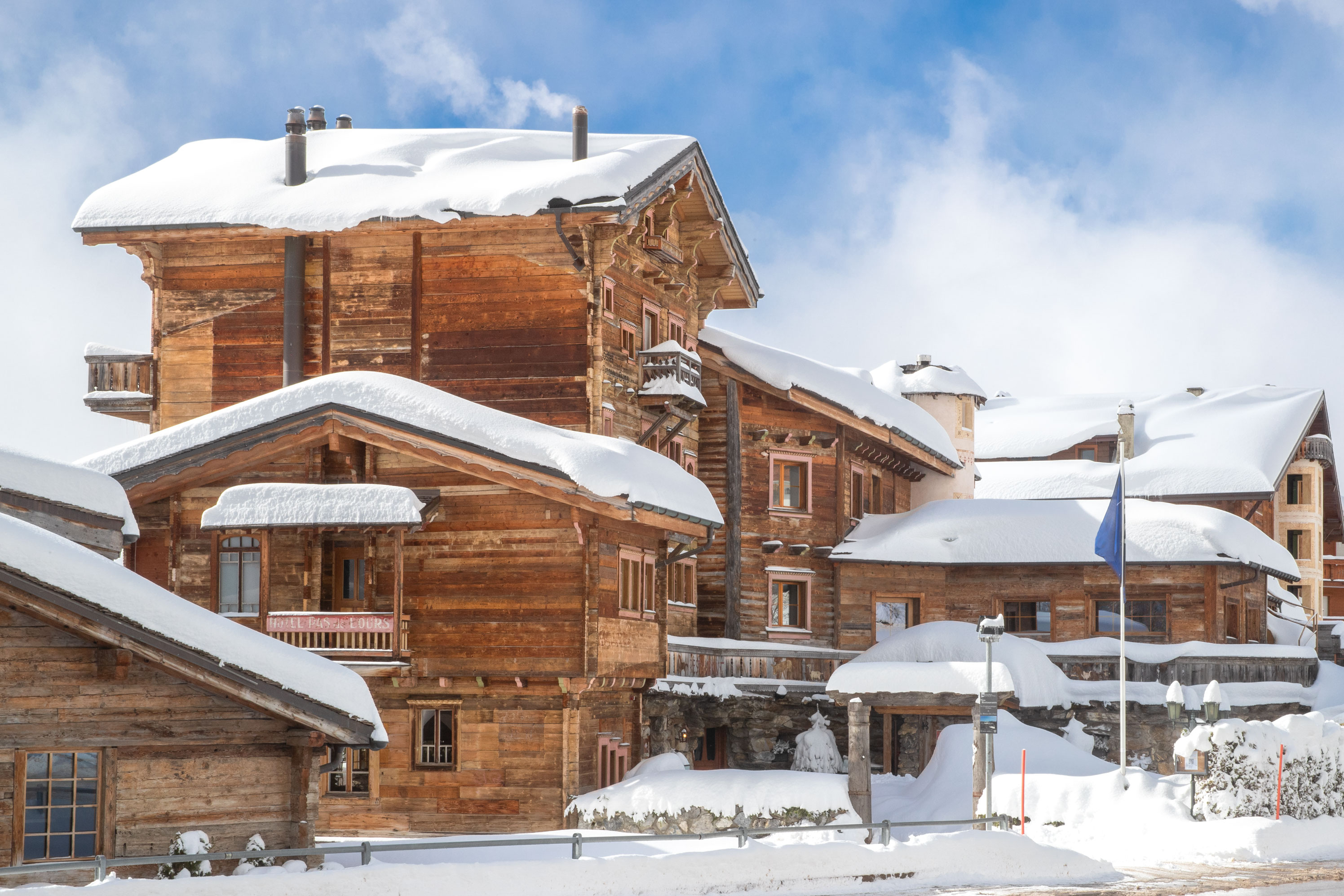 Hostellerie du Pas de l’Ours - Luxury ski hotel gallery image 2 showing alpine architecture, interior design, or mountain views