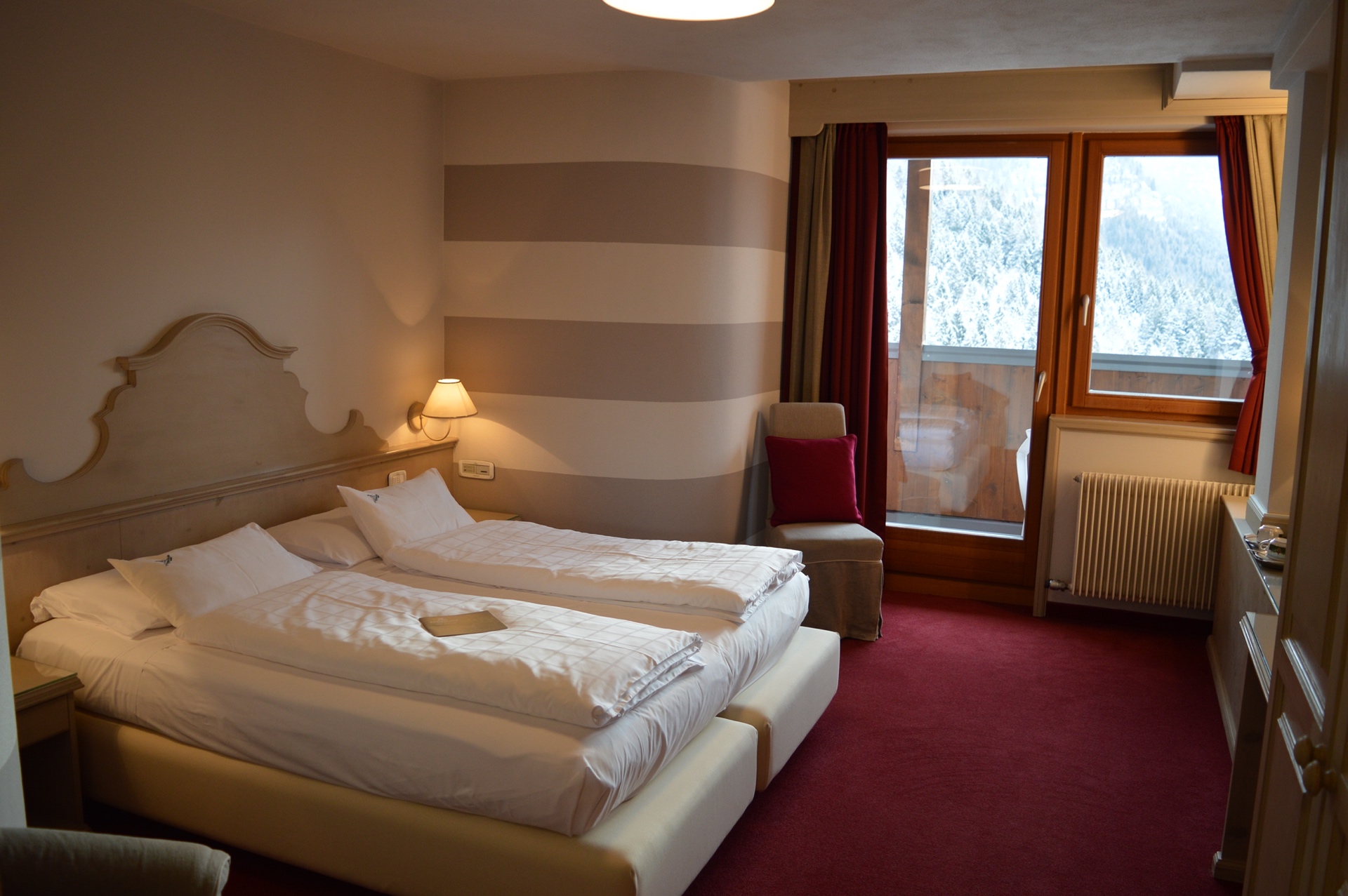 Biohotel Hermitage - Luxury ski hotel gallery image 9 showing alpine architecture, interior design, or mountain views