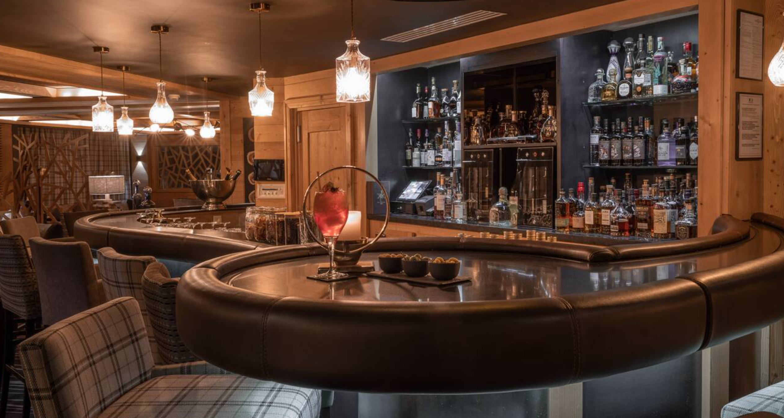 Le Kaïla - Luxury ski hotel gallery image 8 showing alpine architecture, interior design, or mountain views