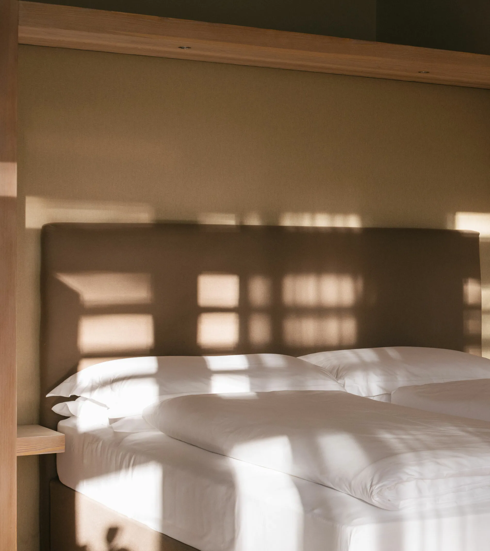 Vigilius Mountain Resort - Luxury ski hotel gallery image 18 showing alpine architecture, interior design, or mountain views